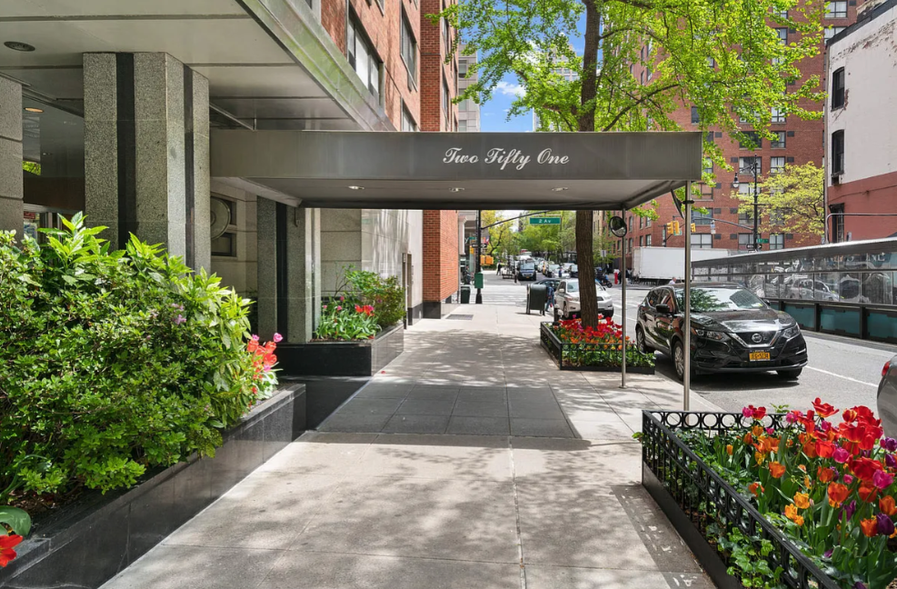 251 East 51st Street, Unit 5A Manhattan, NY 10022 - Photo 17 of 23 a view of a patio with table and chairs potted plants