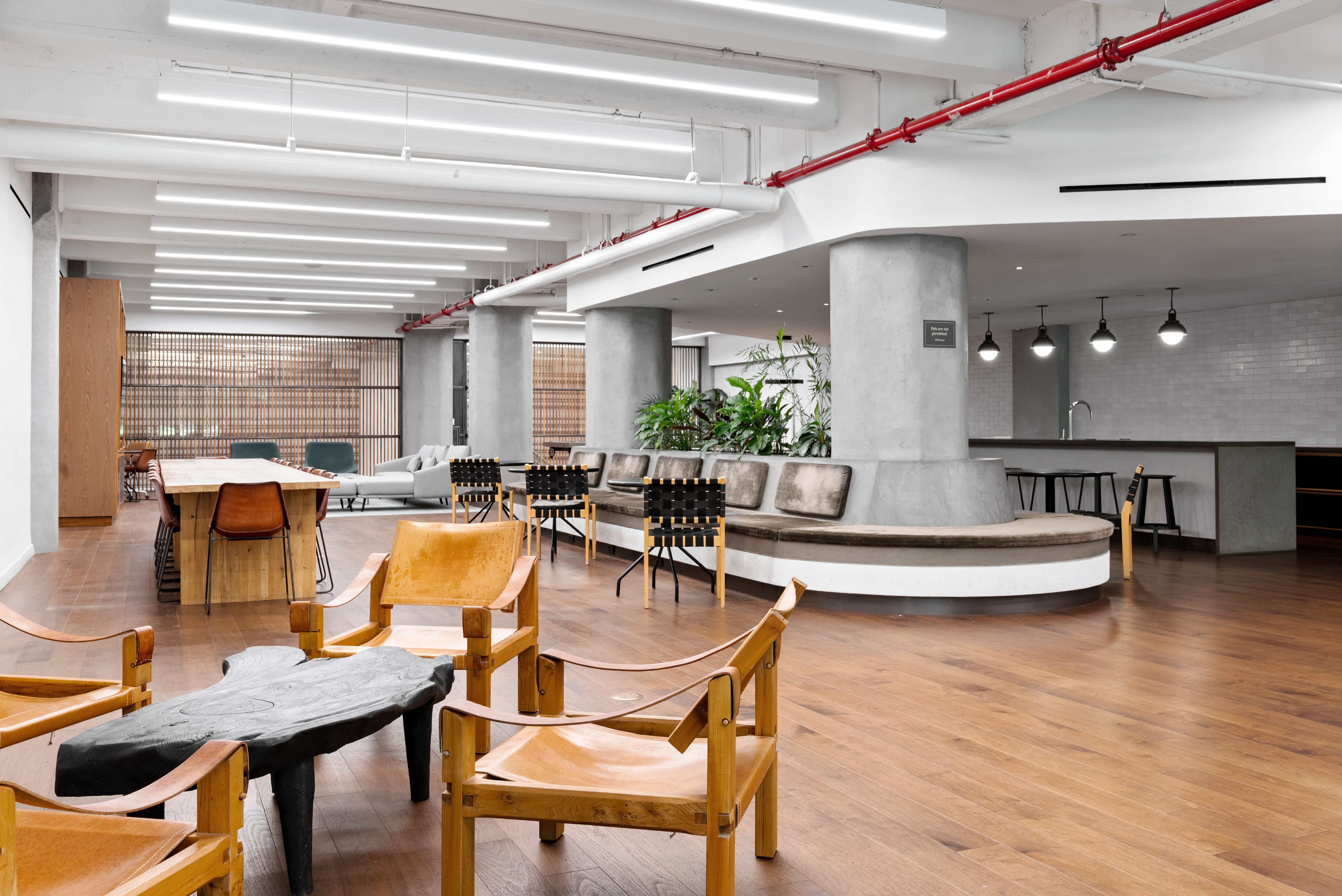 184 Kent Avenue, Unit C107 Brooklyn, NY 11249 - Photo 8 of 18 a view of a dining room with furniture window and wooden floor