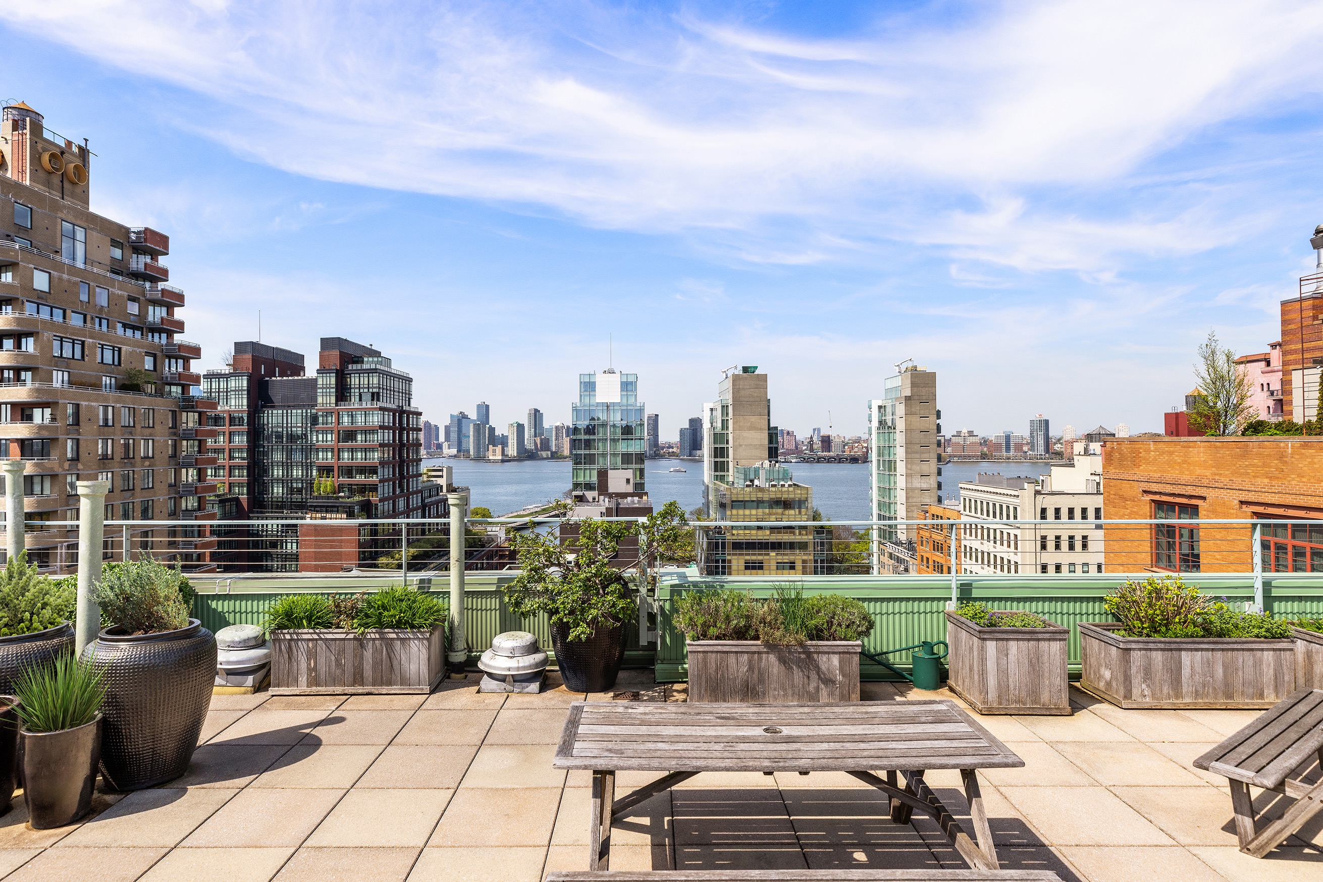 720 Greenwich Street, Unit 1F New York, NY 10014 - Photo 14 of 16 a view of a city with tall buildings