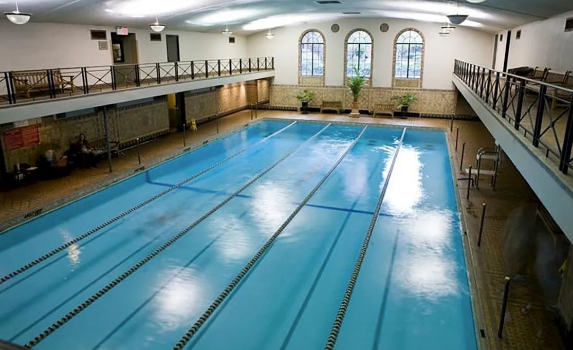 a view of a living room with kitchen