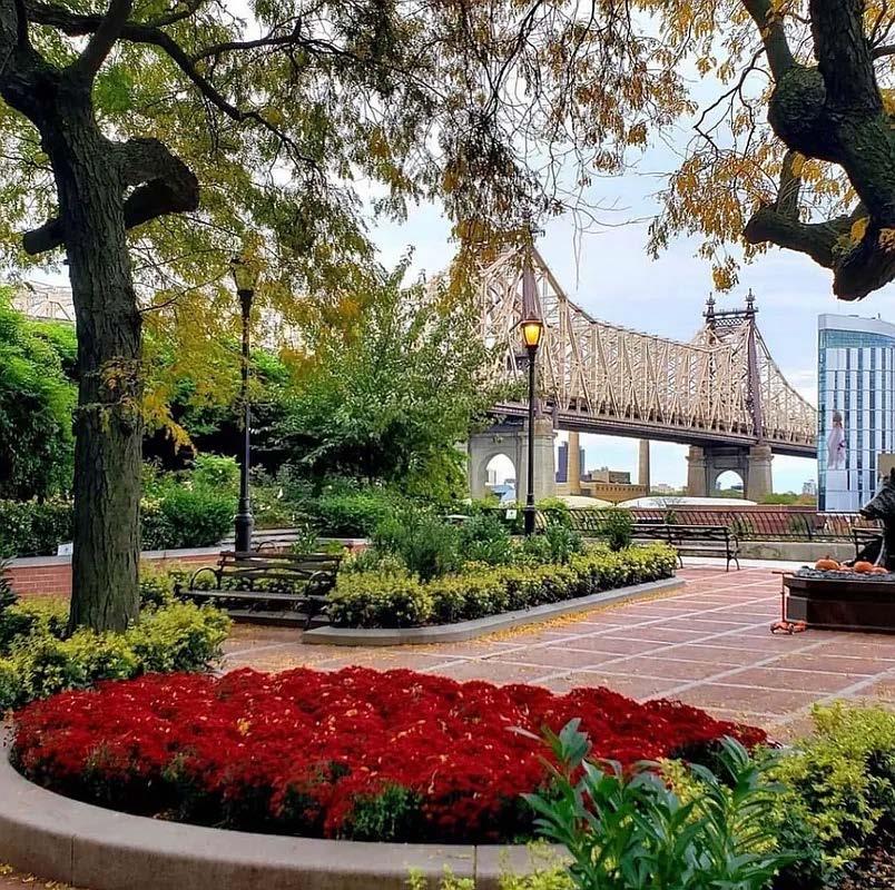 45 Sutton Place South, Unit 14N Manhattan, NY 10022 - Photo 18 of 19 a view of a street with of houses