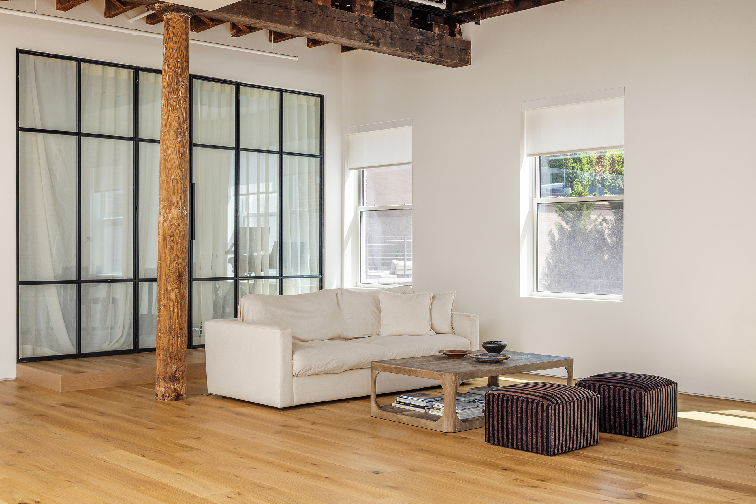 477 Broome Street Manhattan, NY 10013 - Photo 4 of 18 a living room with furniture