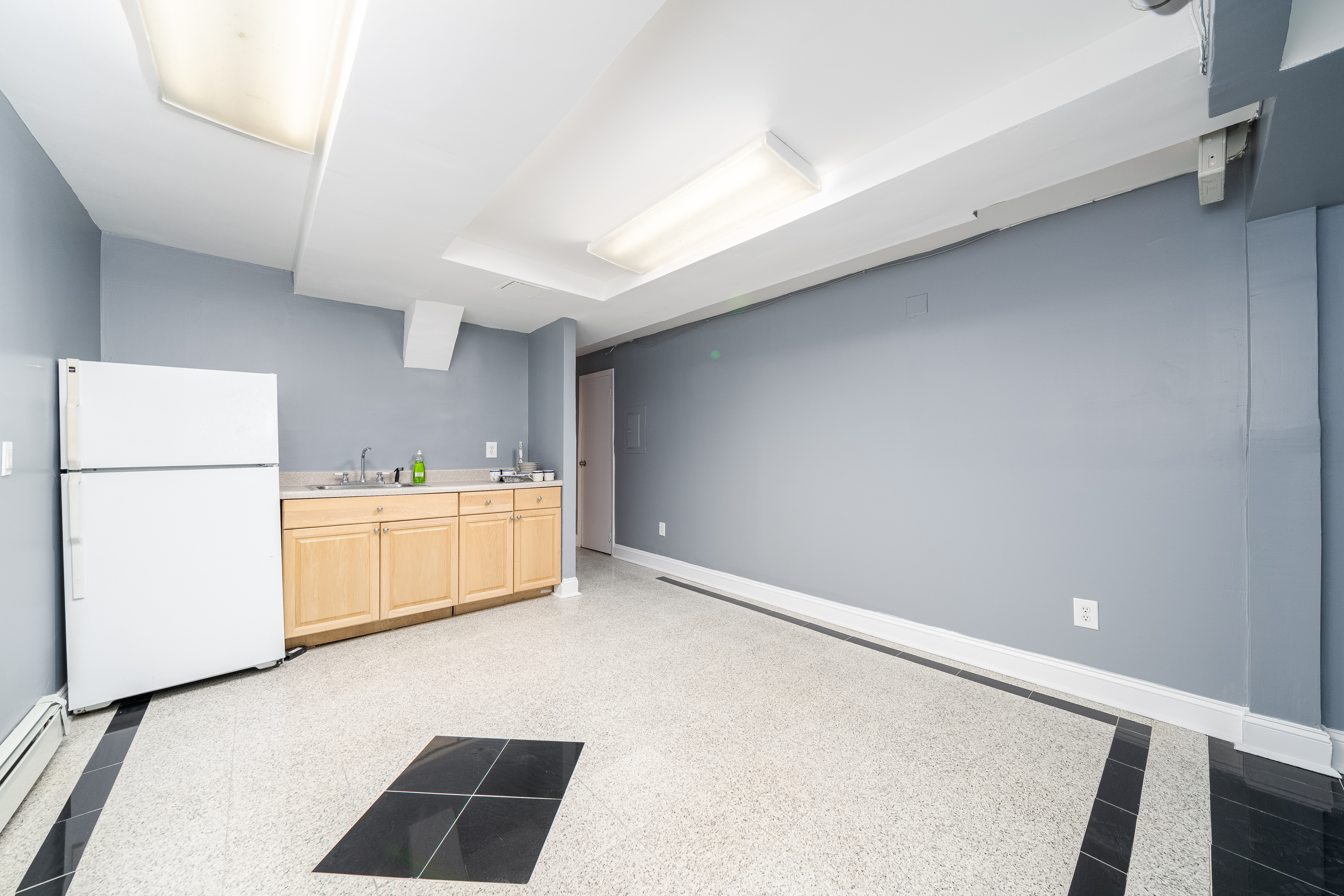 168 Coles Street, Unit BA Jersey City, NJ 07302 - Photo 14 of 29 a utility room with cabinets washer and dryer