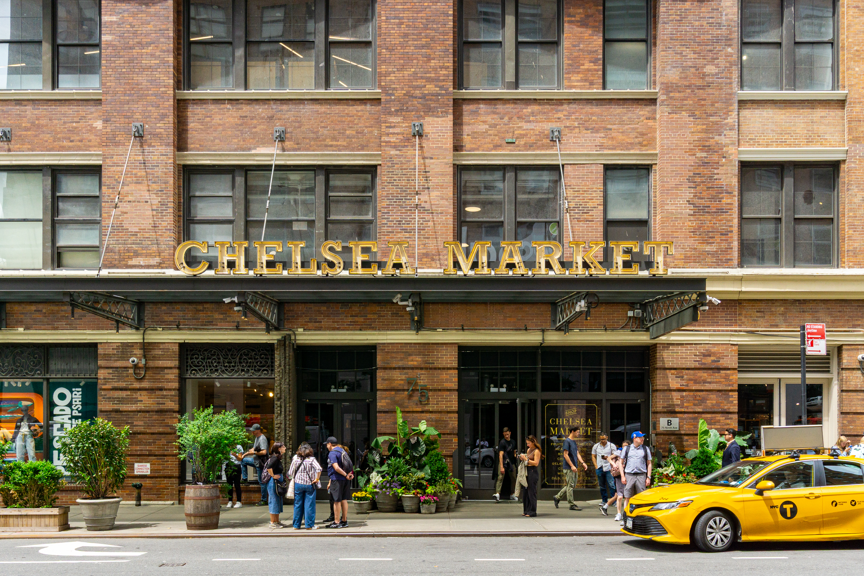 320 West 20th Street, Unit 14 Manhattan, NY 10011 - Photo 10 of 13 a front view of a building with street