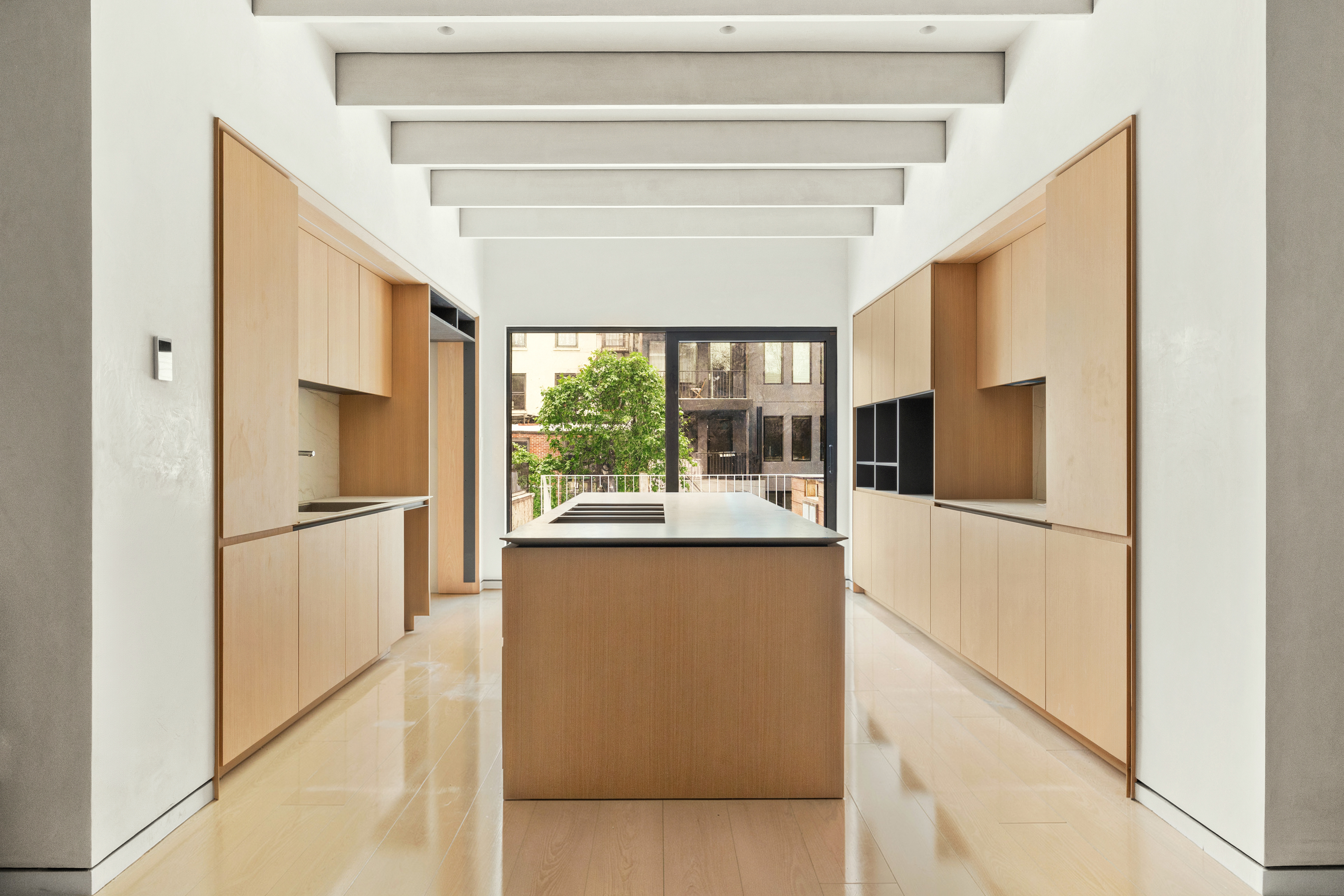 55 Douglass Street, Unit TWNHS Brooklyn, NY 11231 - Photo 3 of 10 a kitchen with stainless steel appliances a refrigerator and a window