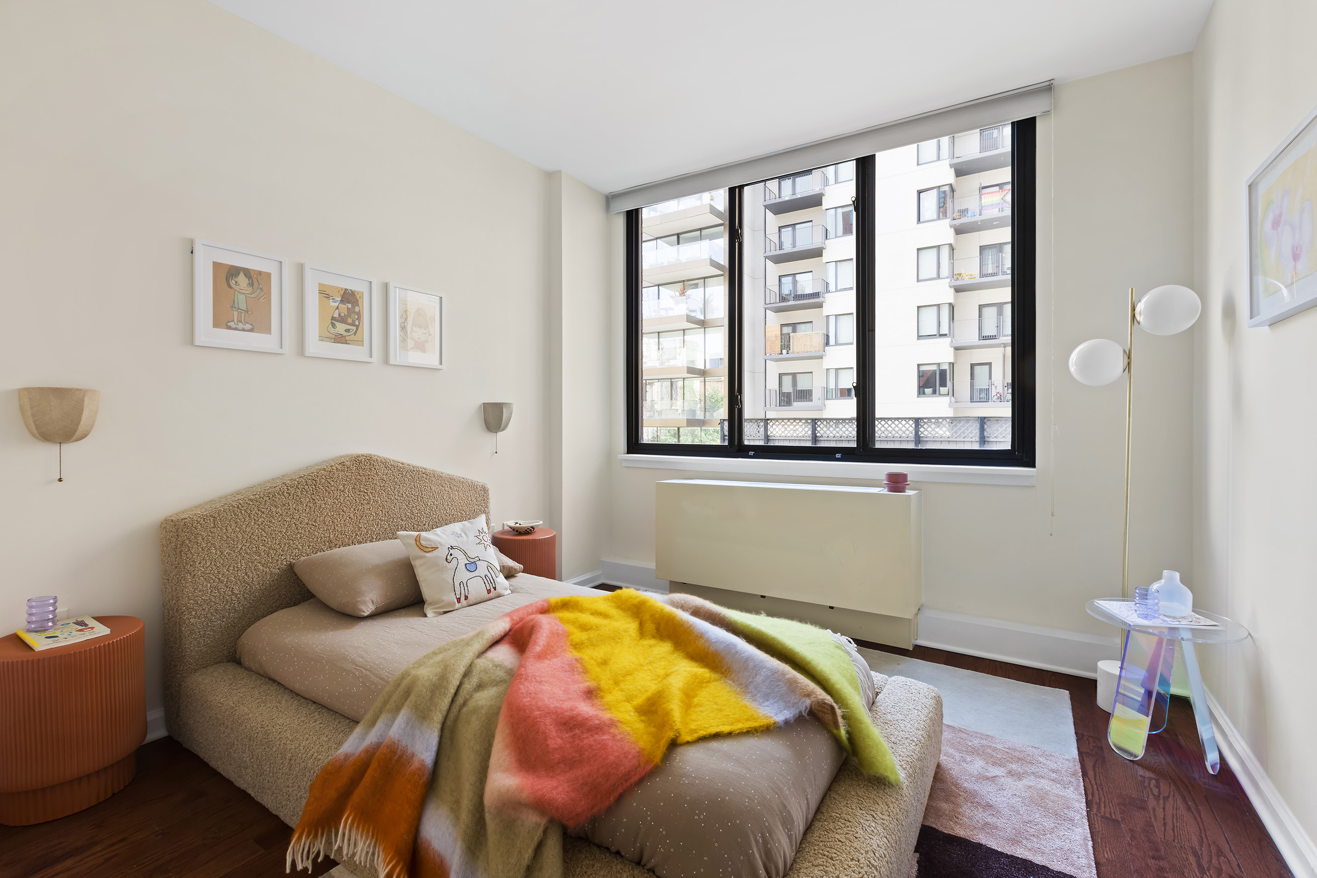 199 Bowery, Unit 3D Manhattan, NY 10002 - Photo 9 of 11 a bedroom with bed and a window