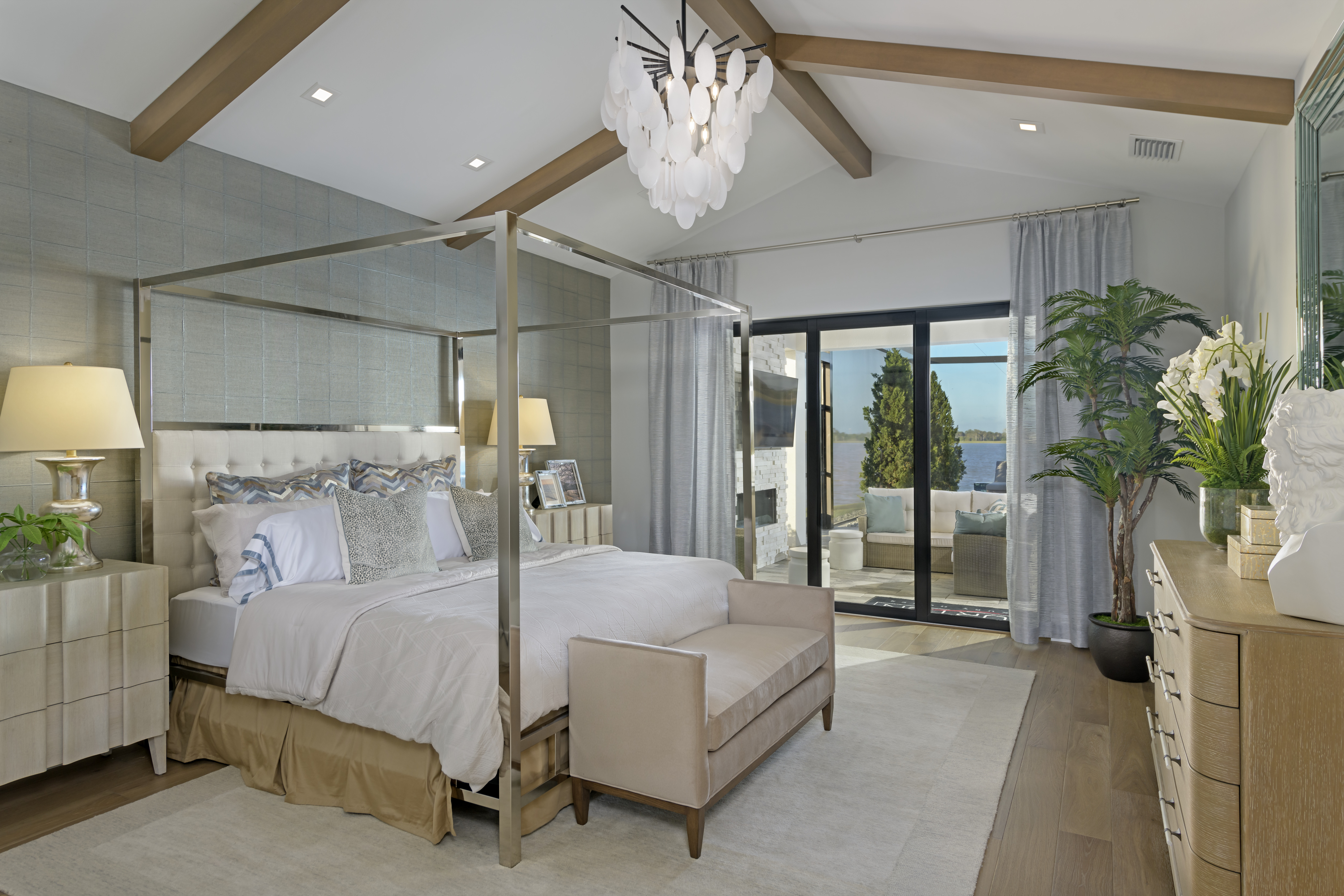 Address Upon Request Rockledge, FL 32955 - Photo 14 of 28 a bedroom with a large bed and a chandelier