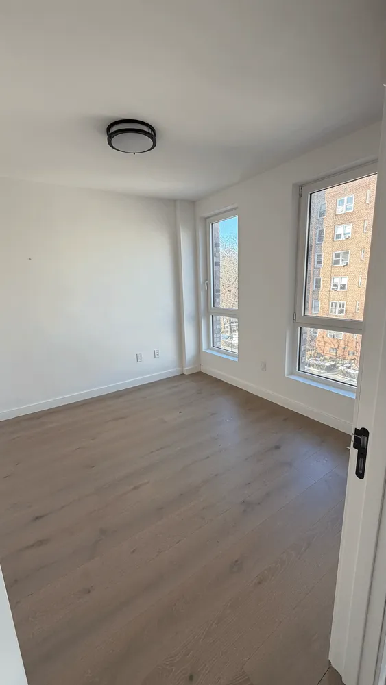 an empty room with windows
