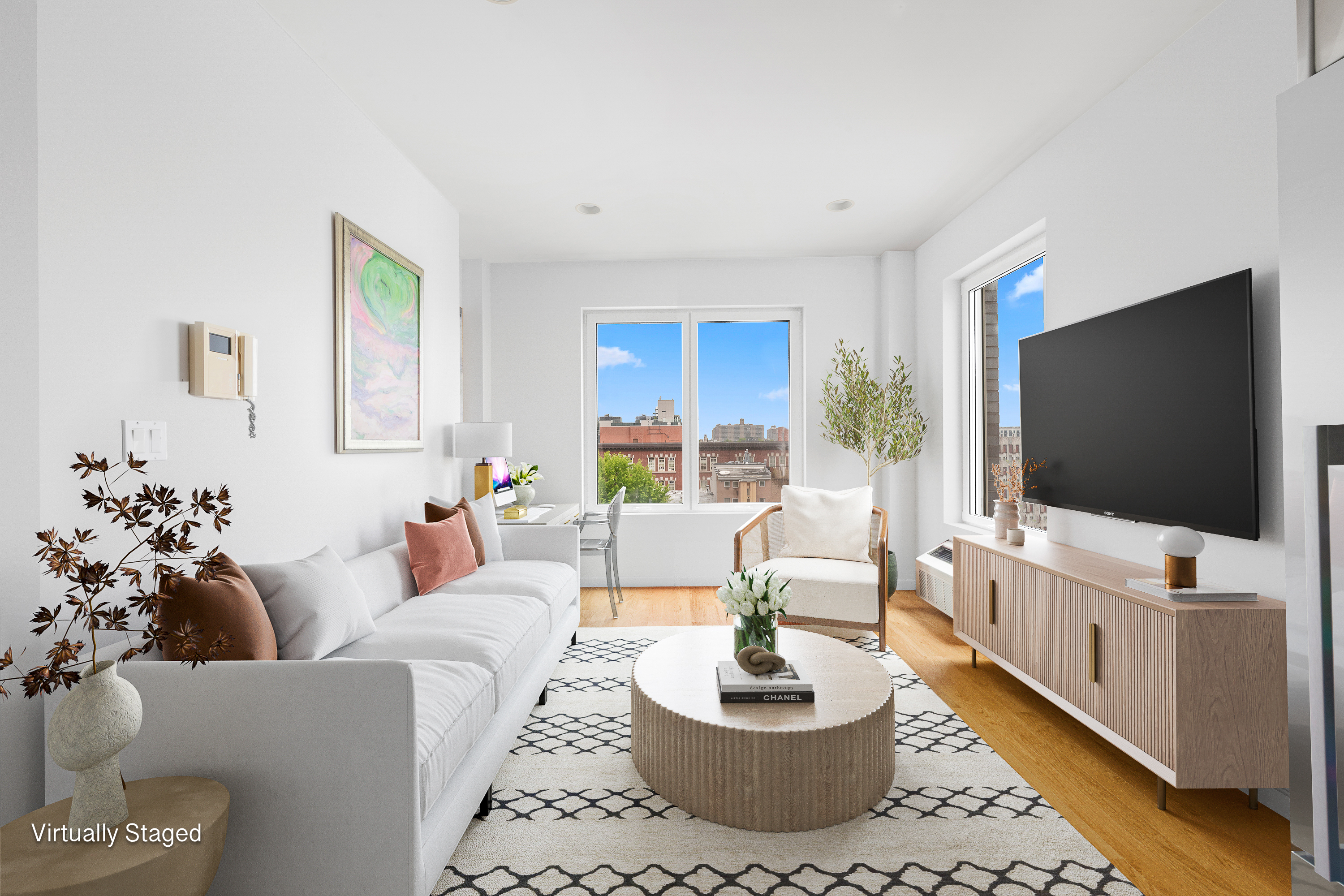 a living room with furniture and a flat screen tv