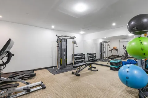 a view of a room with gym equipment