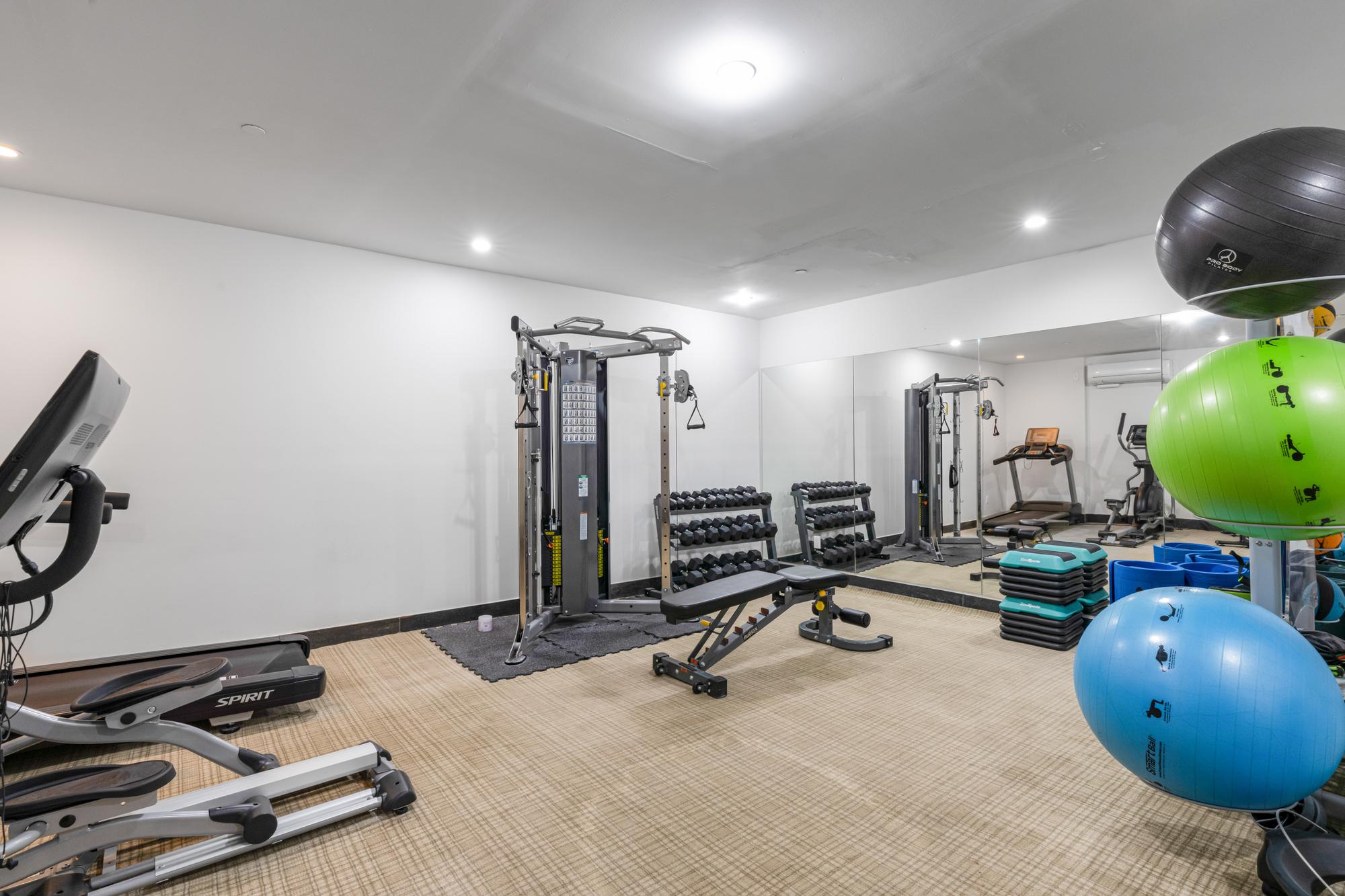 5-25 47th Road, Unit 2A Queens, NY 11101 - Photo 13 of 17 a view of a room with gym equipment