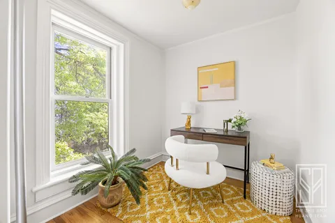 a living room with a couch and a table