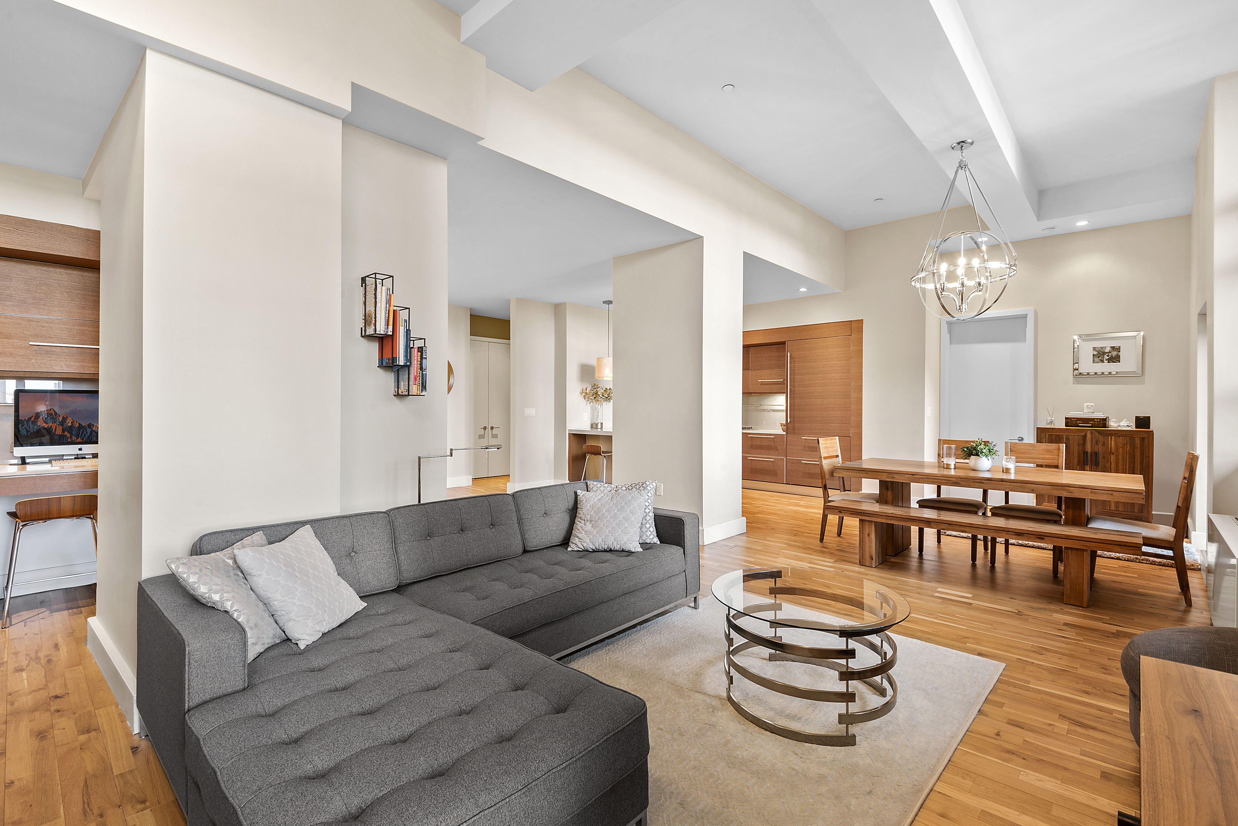 360 Furman Street, Unit 723/724 Brooklyn, NY 11201 - Photo 11 of 63 a living room with furniture kitchen view and large windows