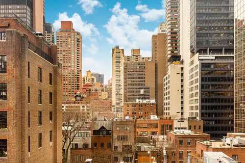 a city view with tall buildings