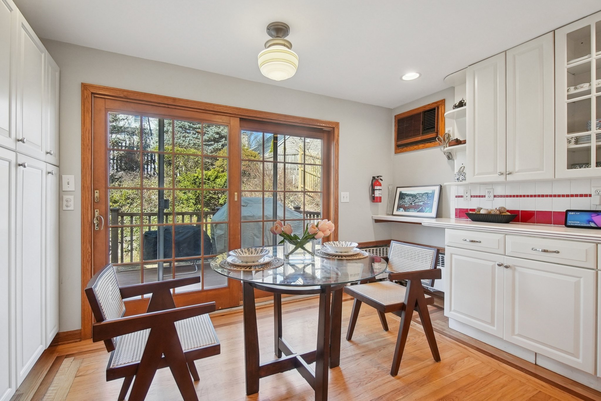 877 Ridgewood Road Millburn, NJ 07041 - Photo 12 of 37 a dining room with furniture and a floor to ceiling window