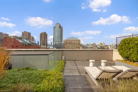 a view of a terrace with sitting area