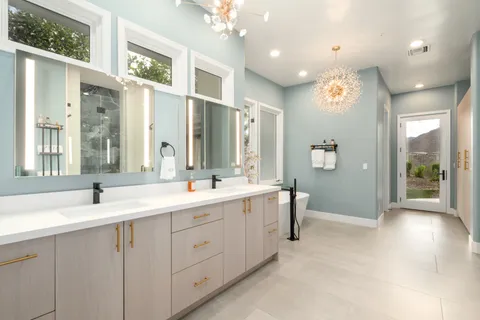 a bathroom with a bathtub and a shower