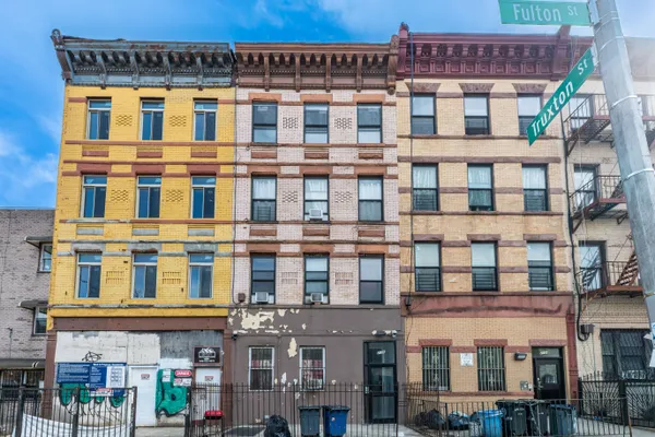 a front view of a building with glass windows
