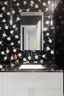 a bathroom sink with a mirror