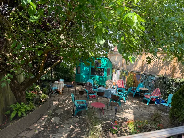 a backyard of a house with lots of green space
