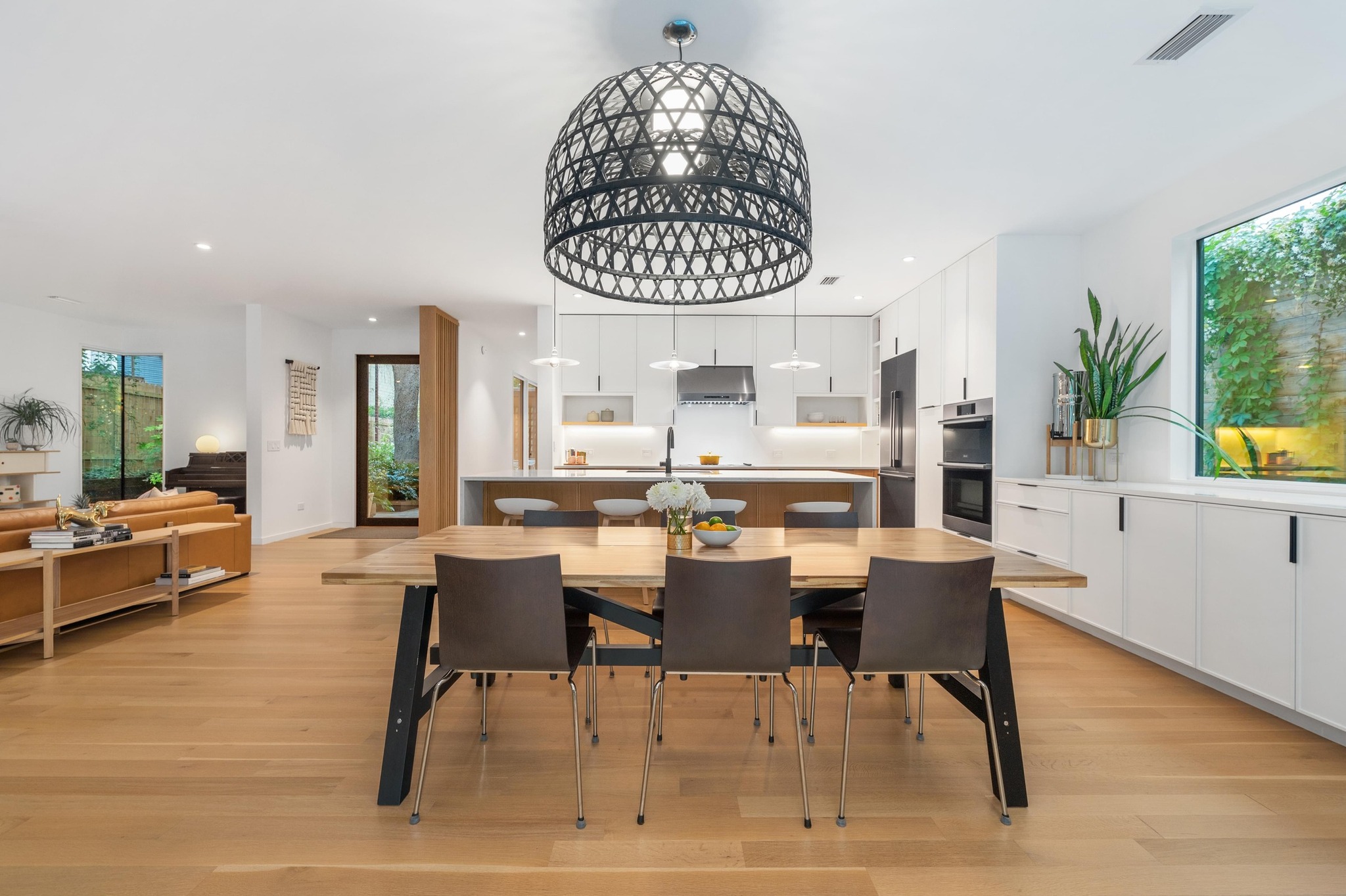 1206 Bickler Road Austin, TX 78704 - Photo 27 of 65 a dining room with a table and chairs