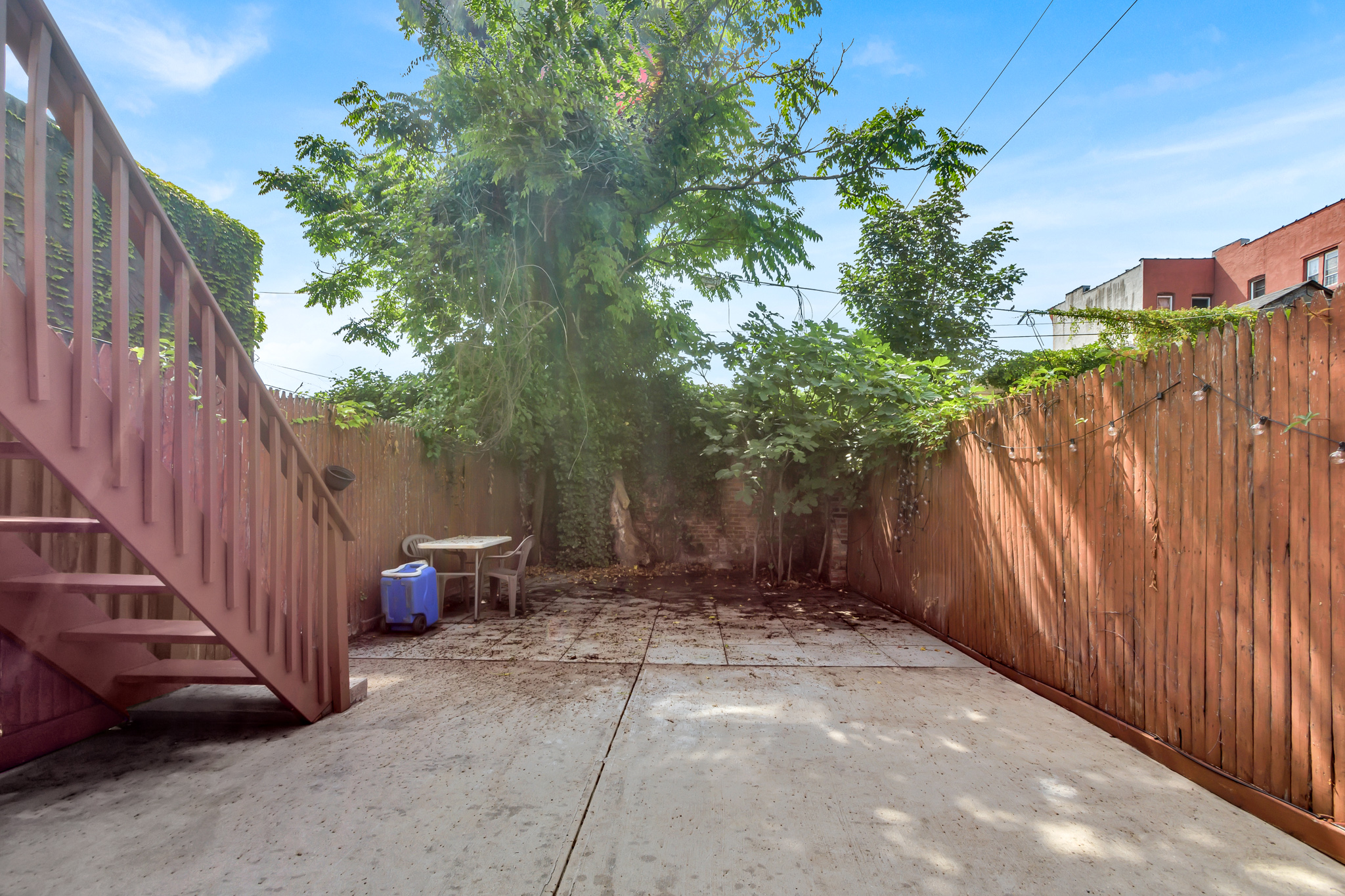 28 Roosevelt Place, Unit 2 Brooklyn, NY 11233 - Photo 5 of 12 a view of a backyard with pathway
