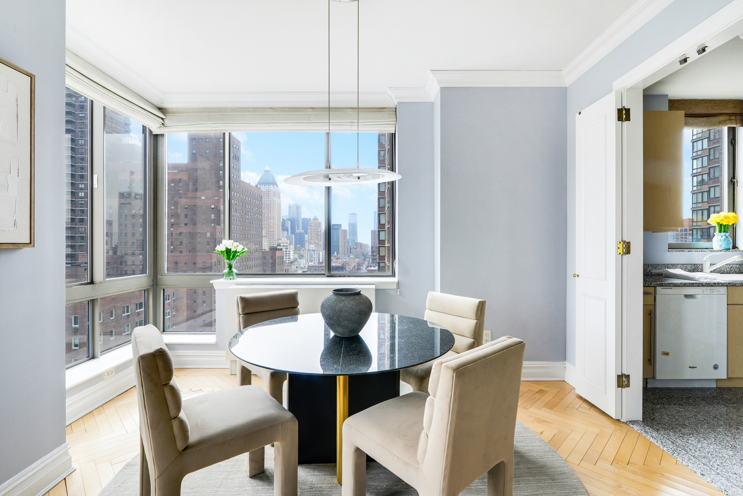 2 Columbus Avenue, Unit 17C Manhattan, NY 10023 - Photo 5 of 19 a dining room with furniture and window