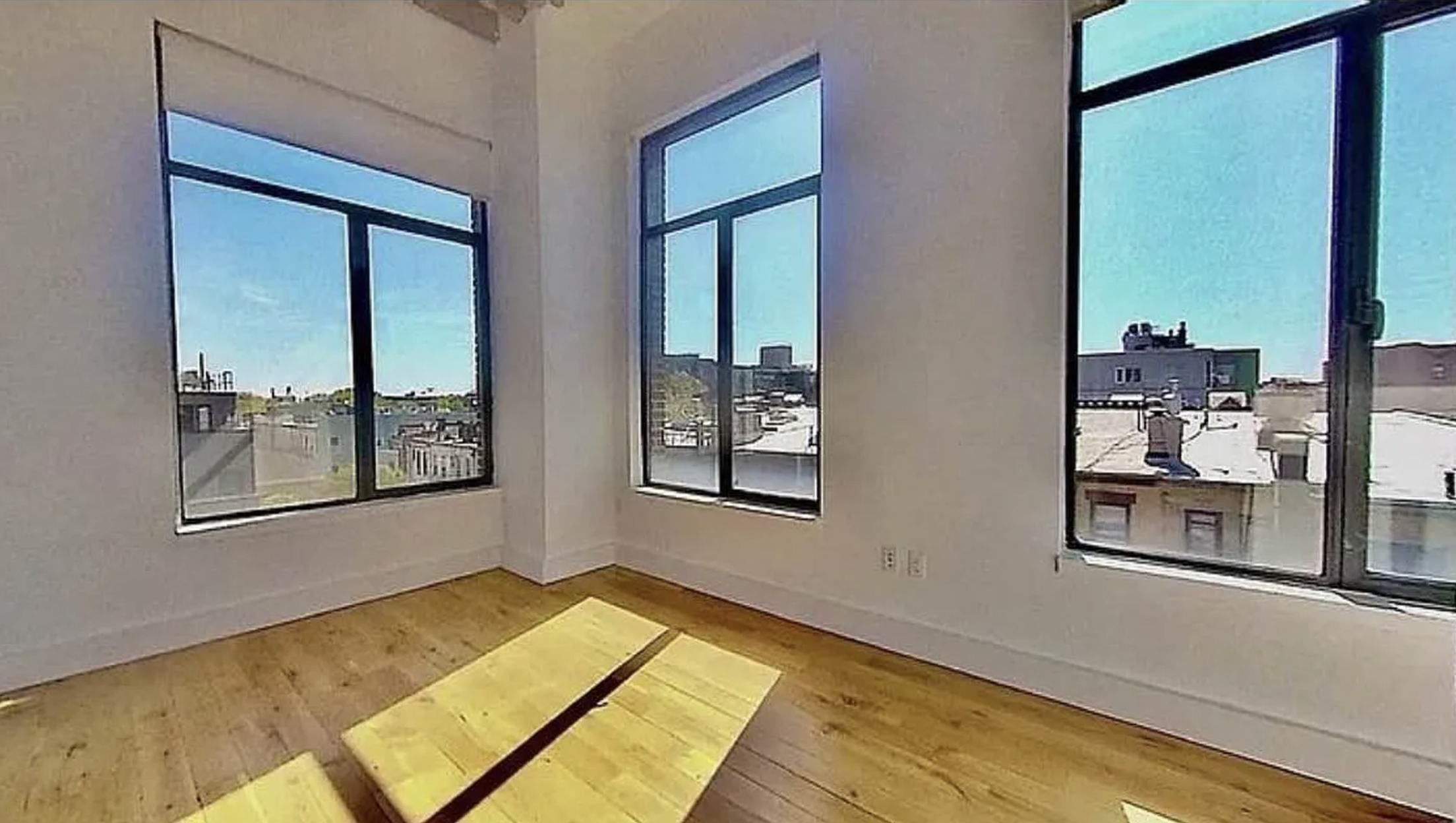 139 North 10th Street, Unit 4B Brooklyn, NY 11249 - Photo 3 of 10 a view of an empty room with a window