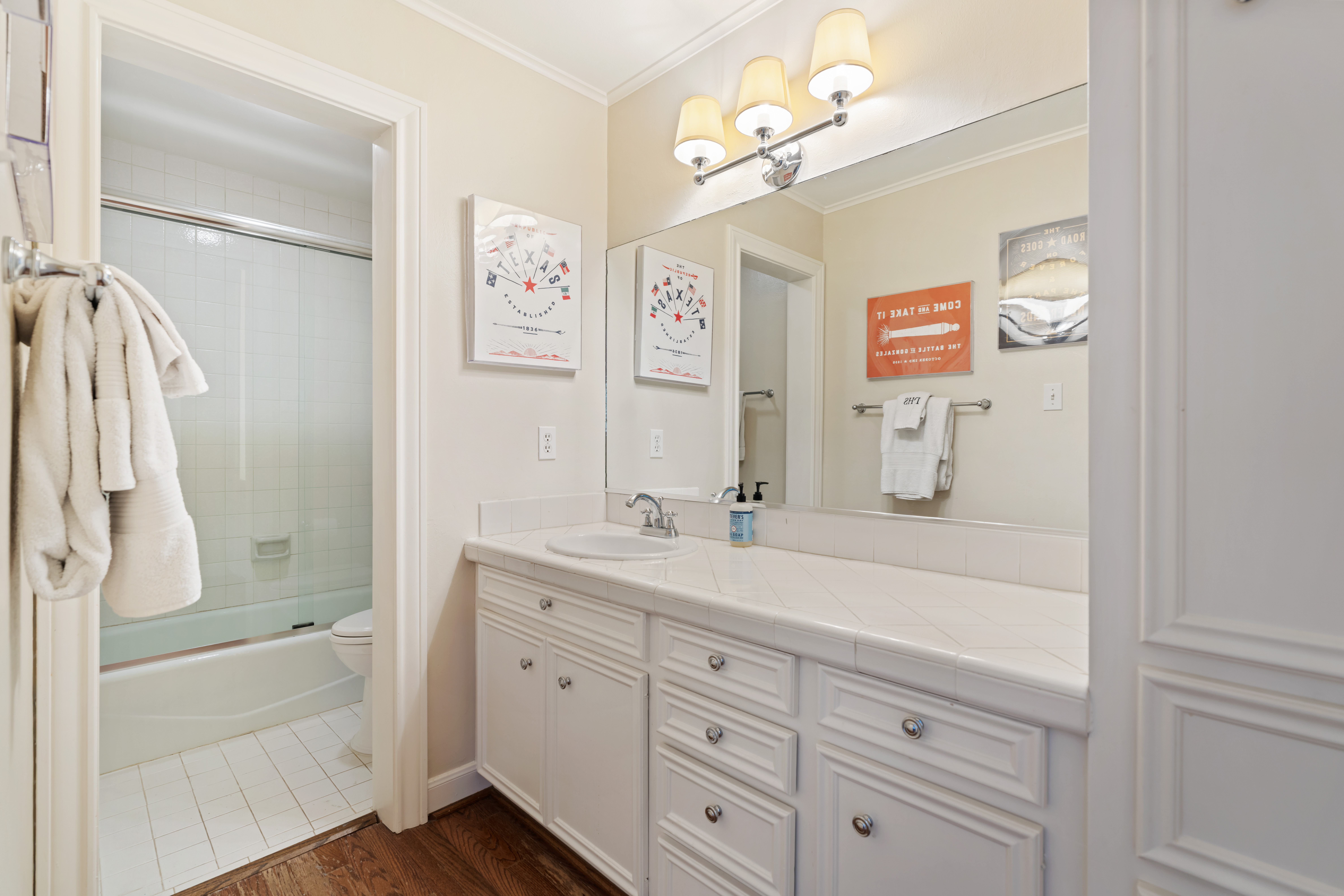 711 Pifer Road Houston, TX 77024 - Photo 42 of 53 a spacious bathroom with a double vanity sink mirror and shower