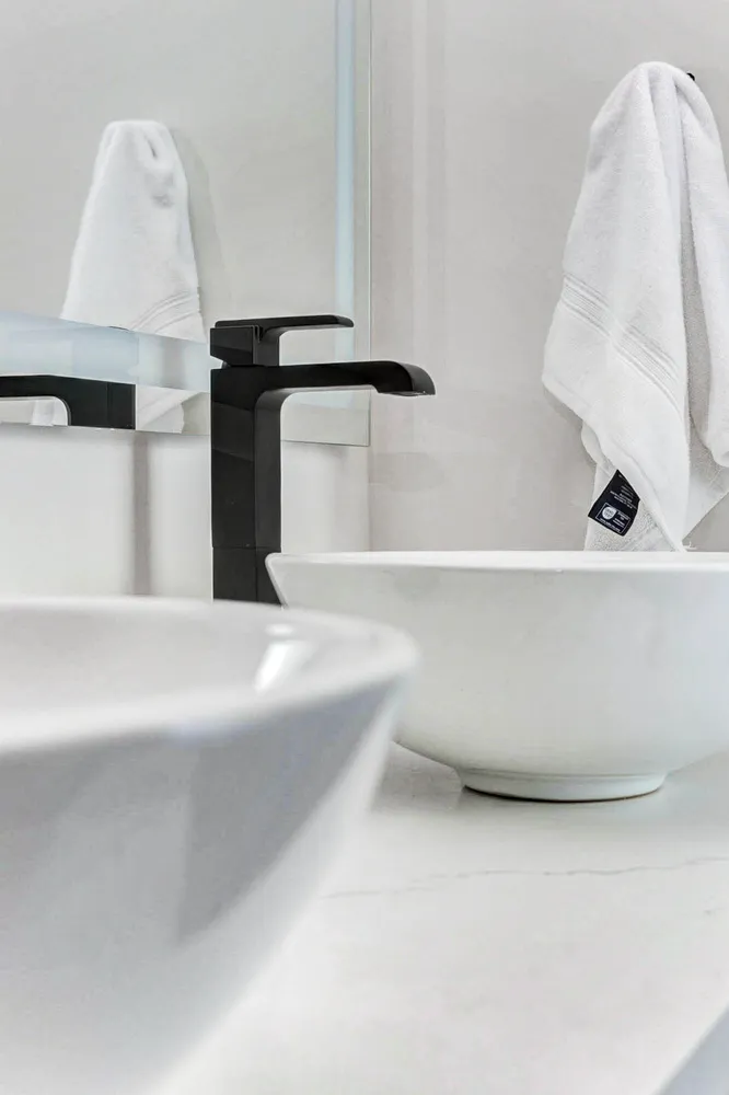 a bathroom with a bathtub and shower