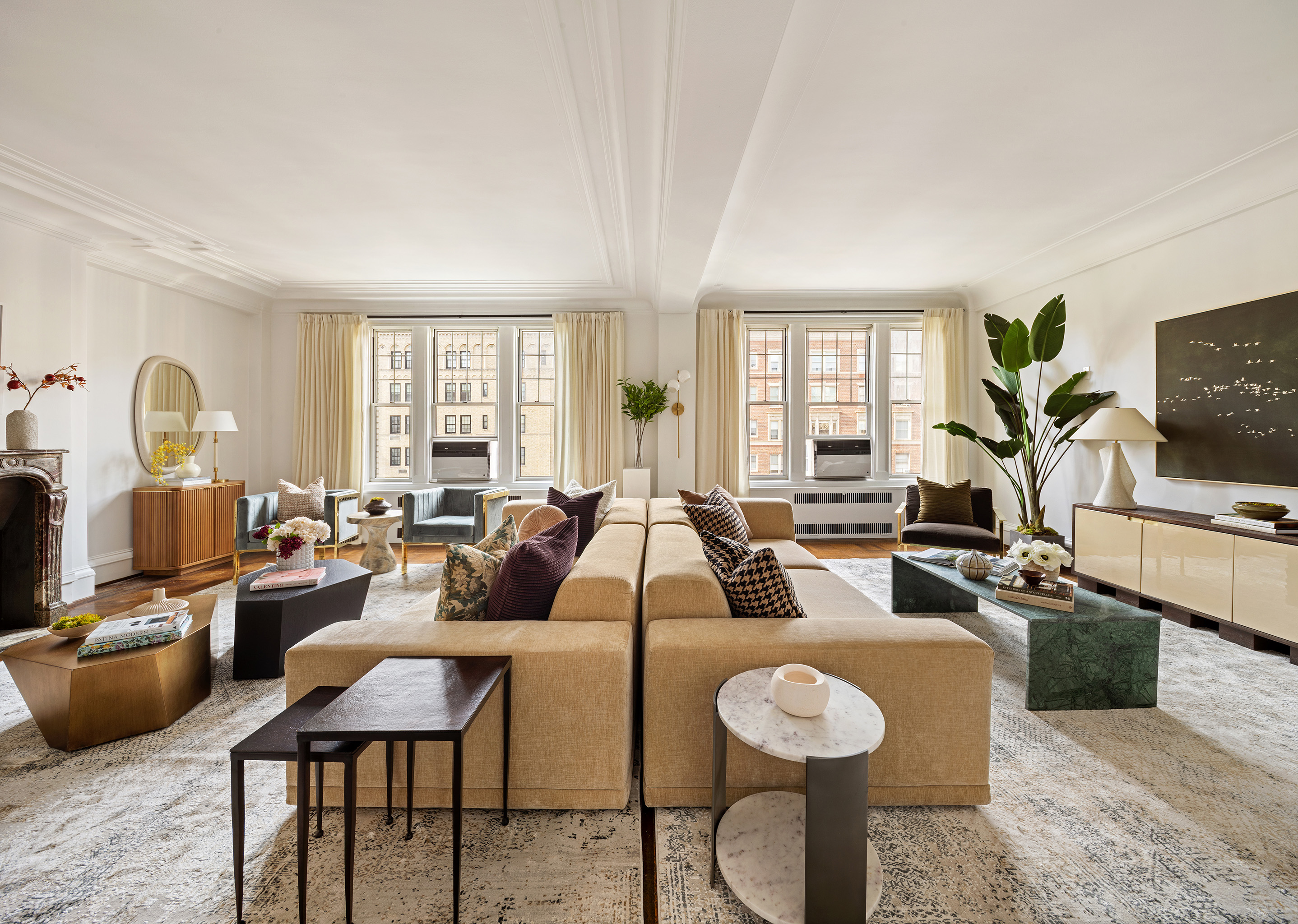 875 Park Avenue, Unit 11C Manhattan, NY 10075 - Photo 3 of 25 a living room with furniture and a flat screen tv