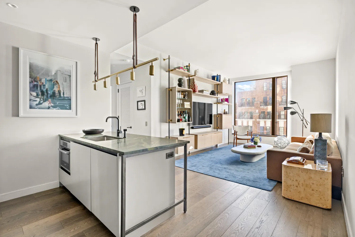 a view of living room with furniture and floor to ceiling window