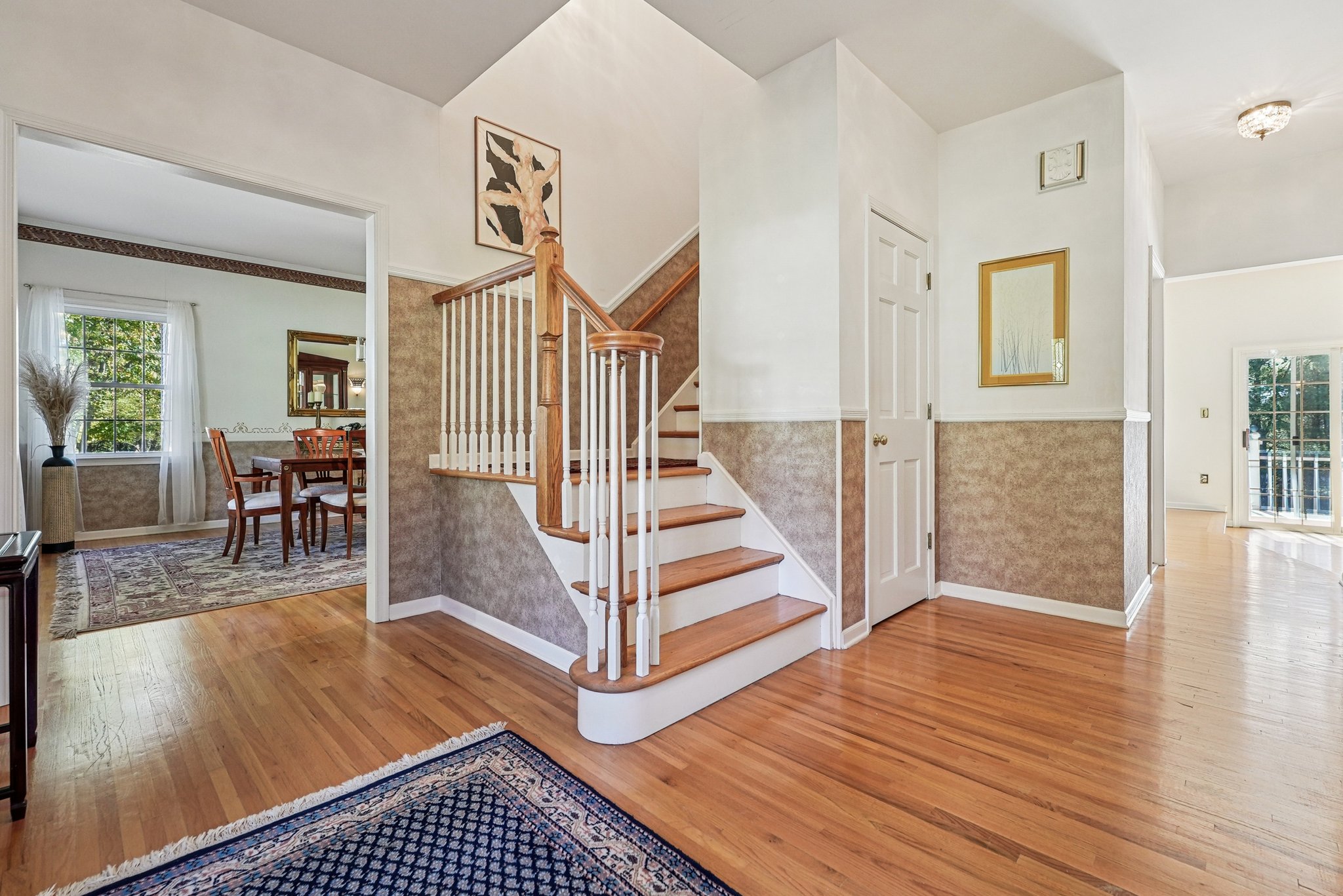 905 Kip Lane Neshanic Station, NJ 08853 - Photo 3 of 50 a view of entryway and hall with wooden floor