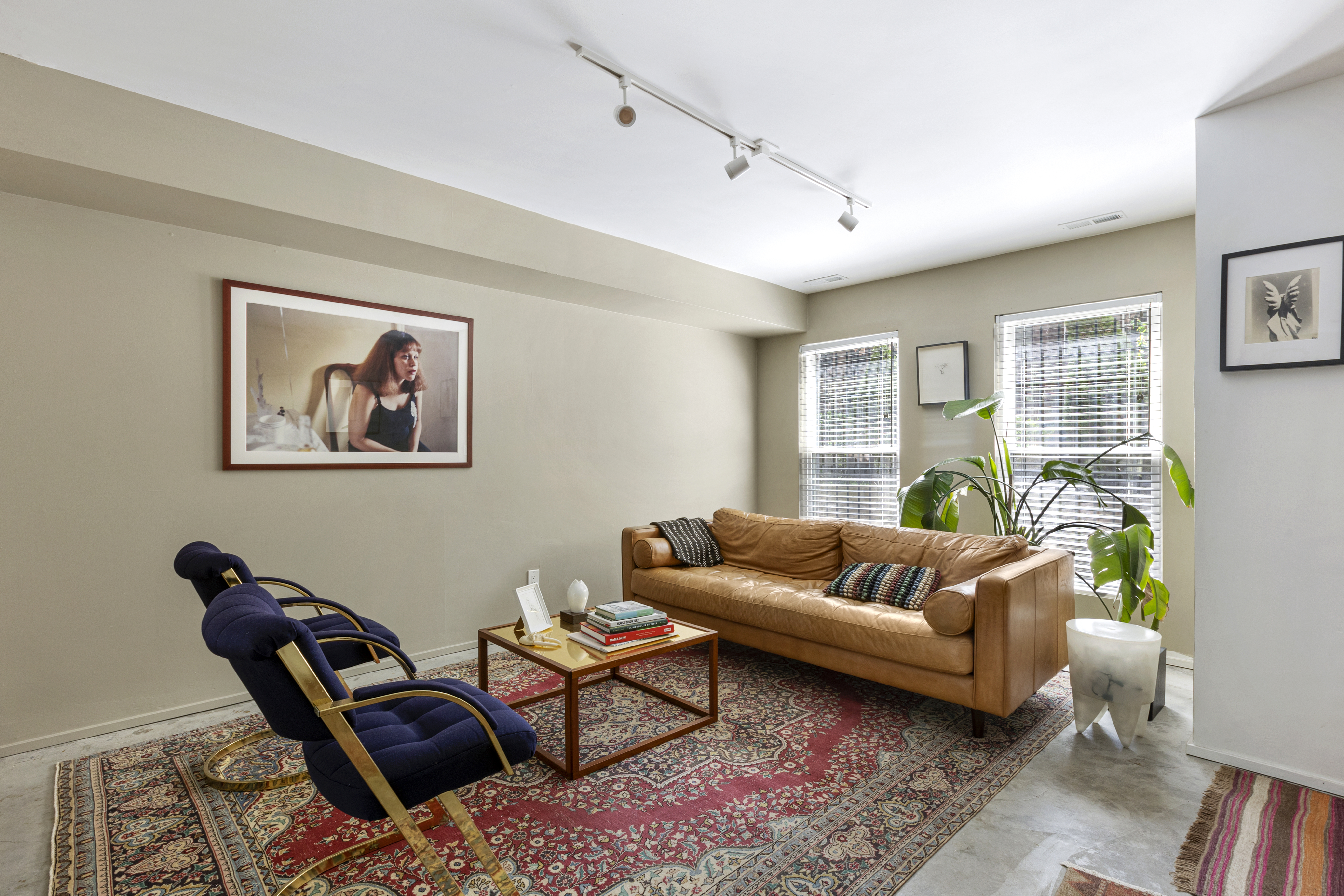 329 Grand Avenue, Unit B Brooklyn, NY 11238 - Photo 3 of 9 a living room with furniture a rug and a window
