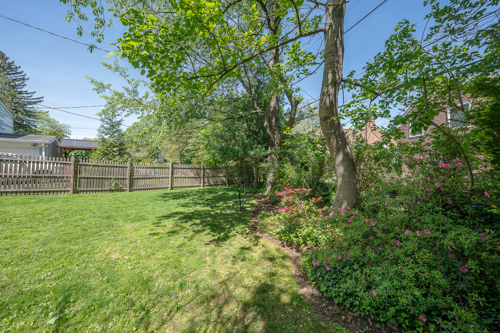 519 Mercer Road Merion Station, PA 19066 - Photo 52 of 58 a view of a yard with a tree