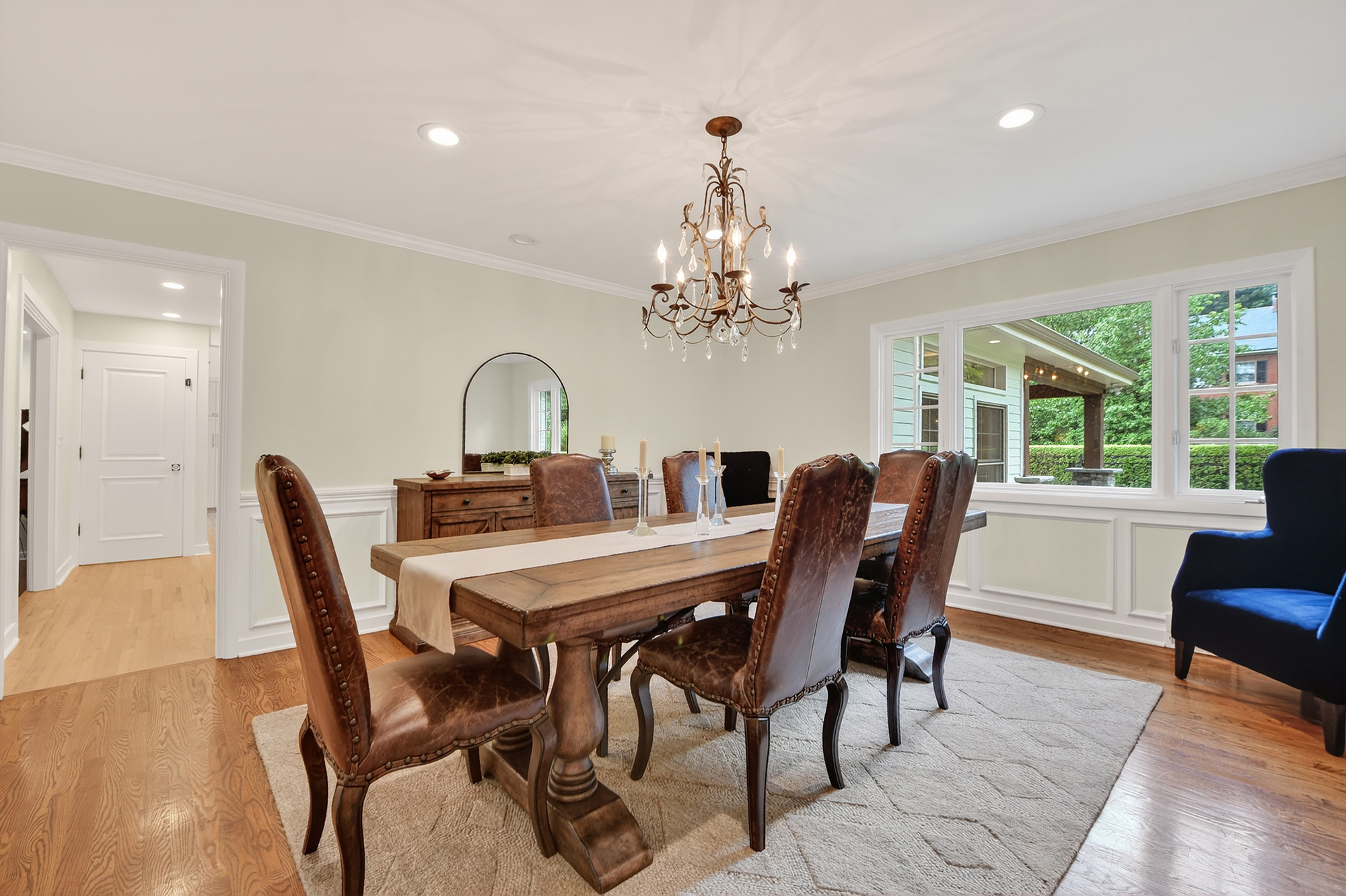 1205 Beaver Road Sewickley, PA 15143 - Photo 43 of 94 a view of a dining room with furniture a chandelier and wooden floor