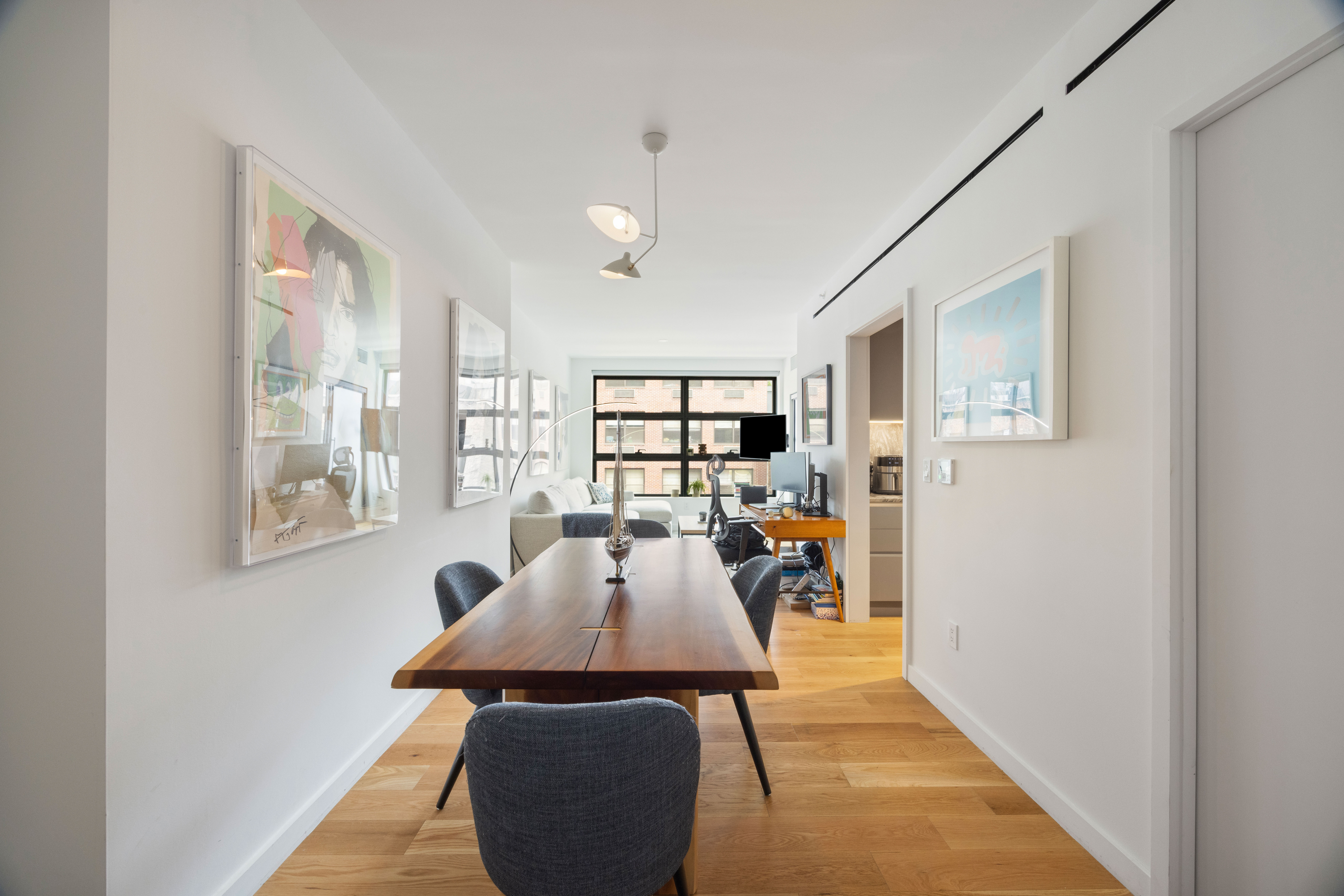 547 West 47th Street, Unit 509 Manhattan, NY 10036 - Photo 6 of 29 a view of a living room and dining room
