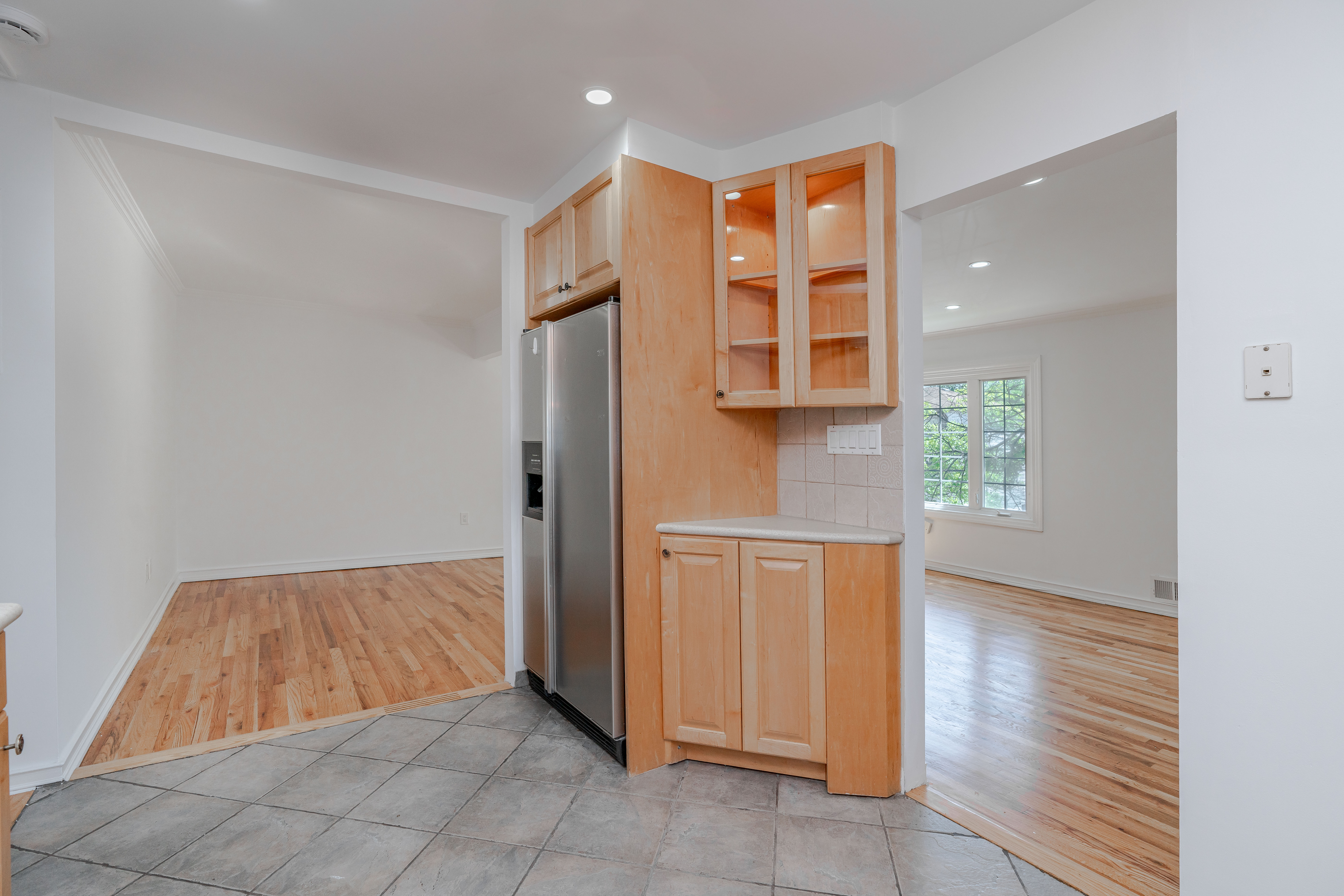 15-80 209th Street, Unit 2 Queens, NY 11360 - Photo 3 of 11 a view of kitchen and utility room