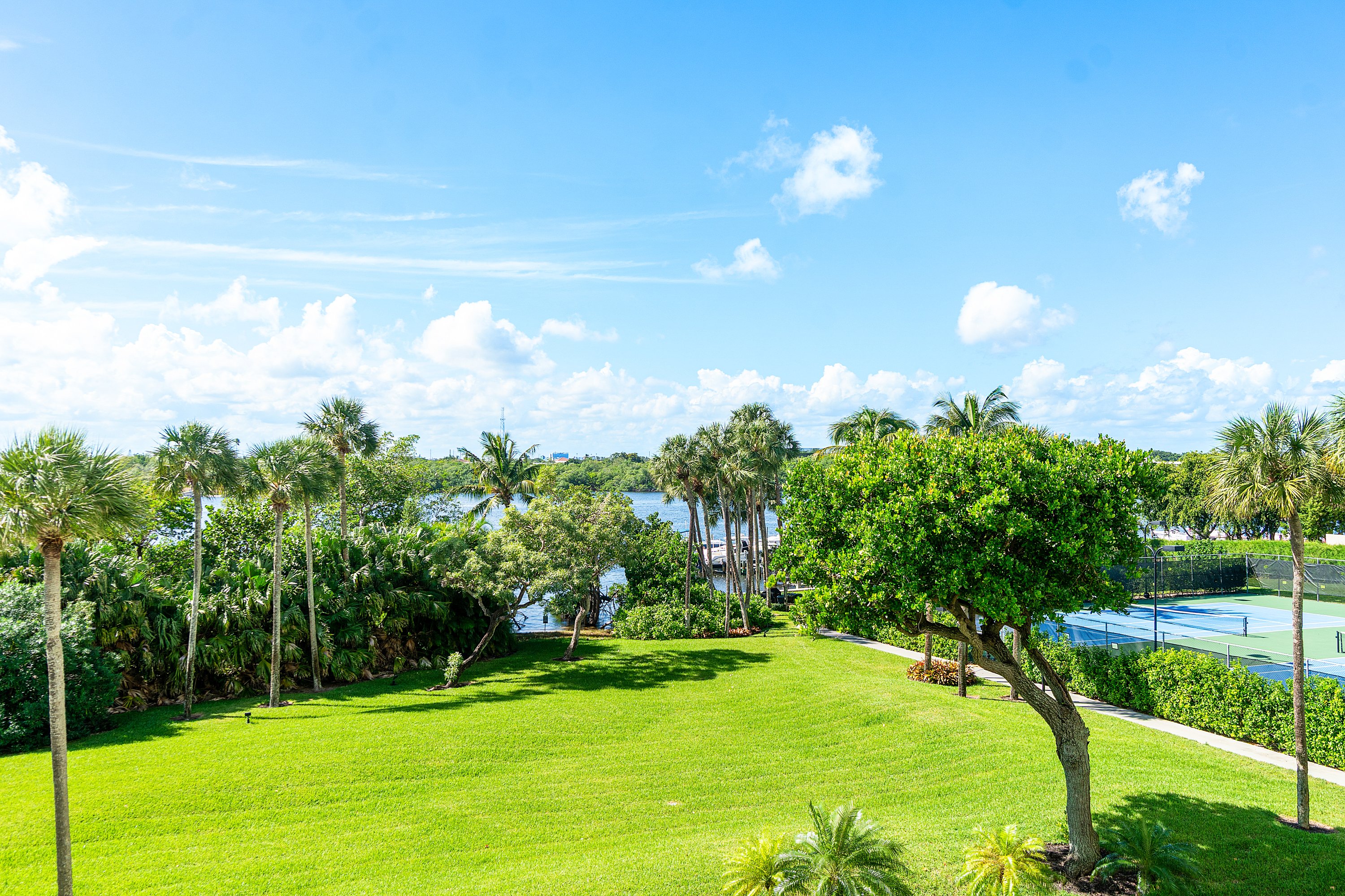 2003 North Ocean Boulevard, Unit 305 Boca Raton, FL 33431 - Photo 30 of 56 a view of a golf course with a fountain