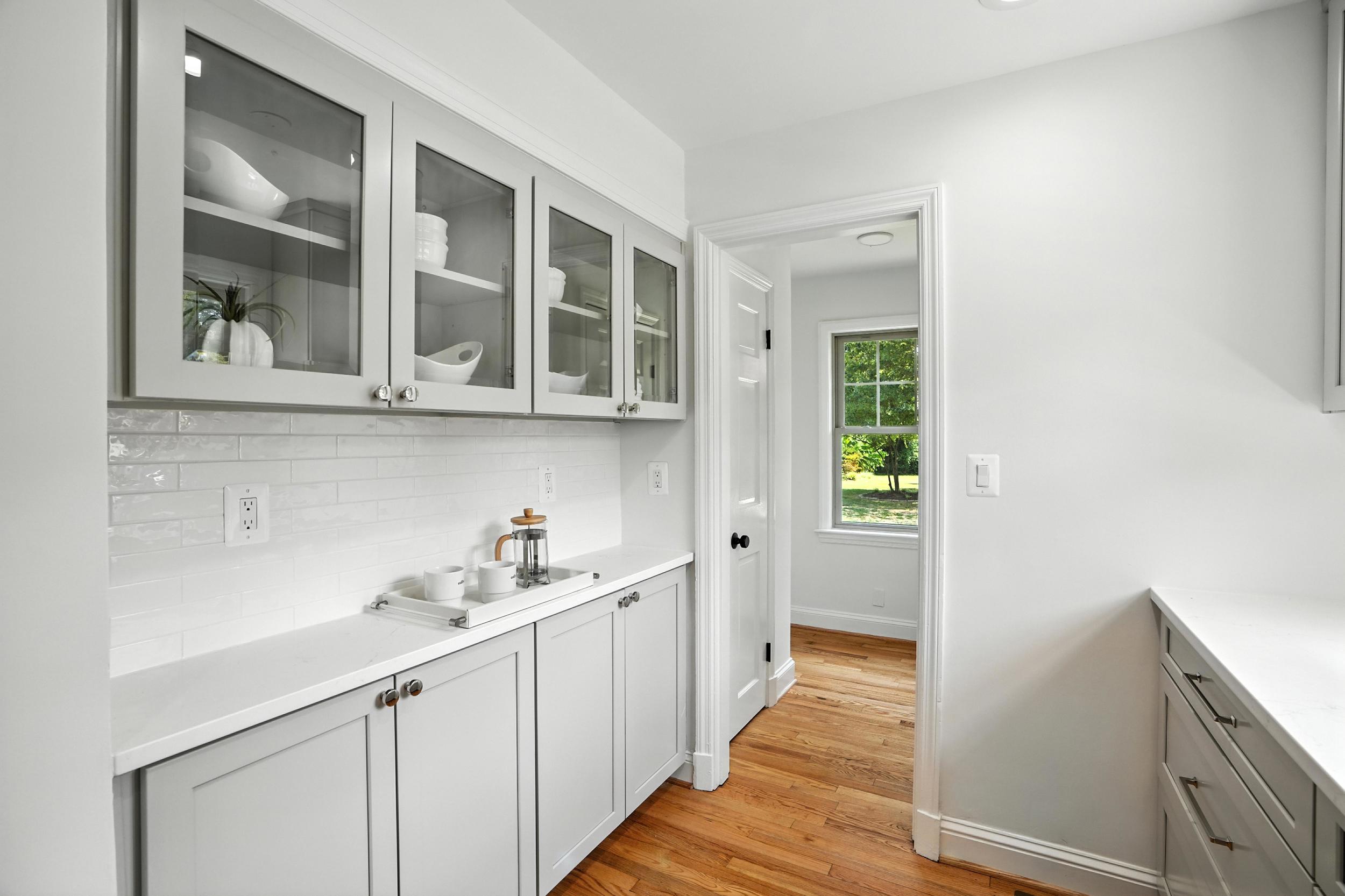 4505 Park Road Alexandria, VA 22312 - Photo 17 of 80 a kitchen with stainless steel appliances granite countertop white cabinets and window