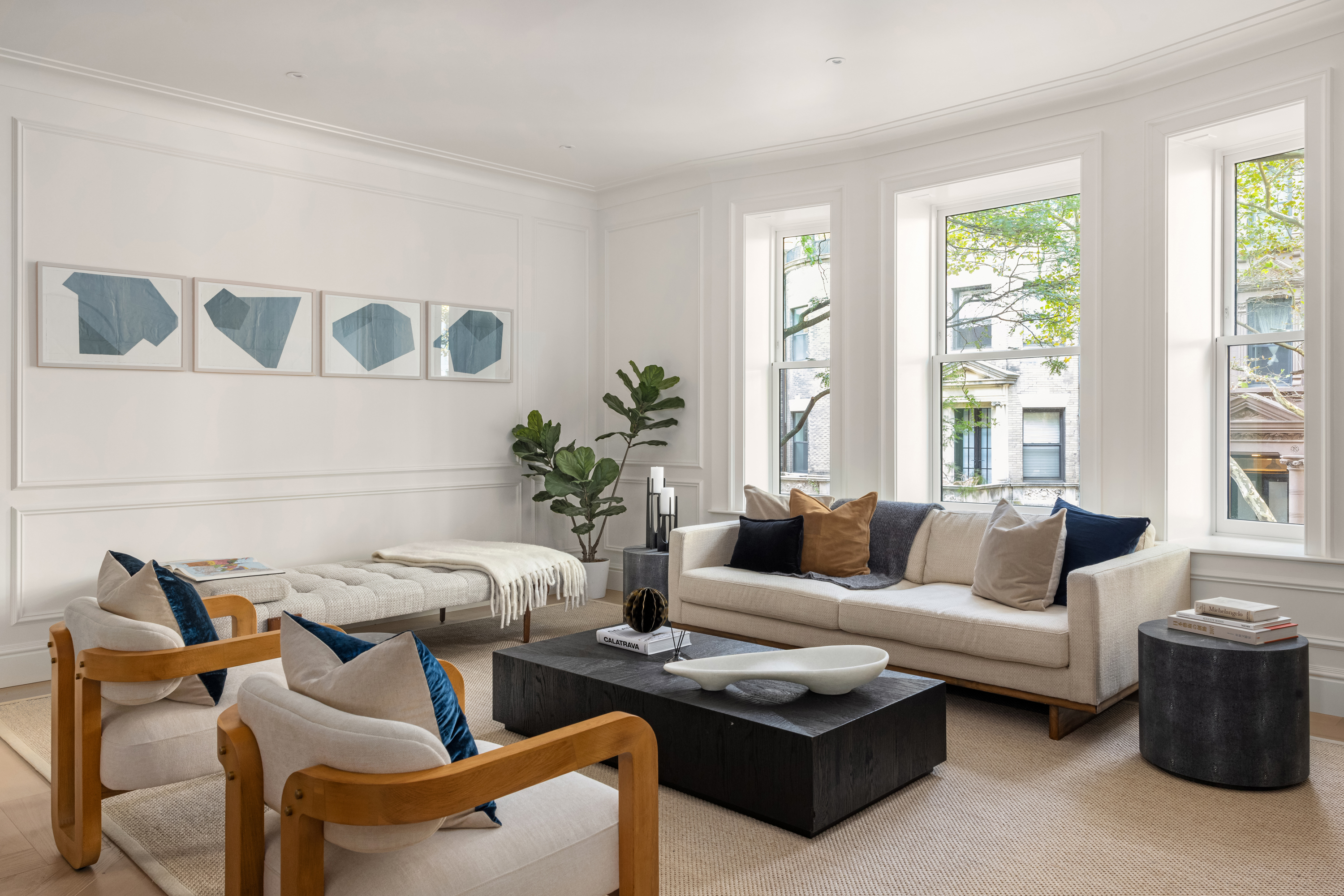 344 West 84th Street, Unit PH Manhattan, NY 10024 - Photo 3 of 19 a living room with furniture and a large window