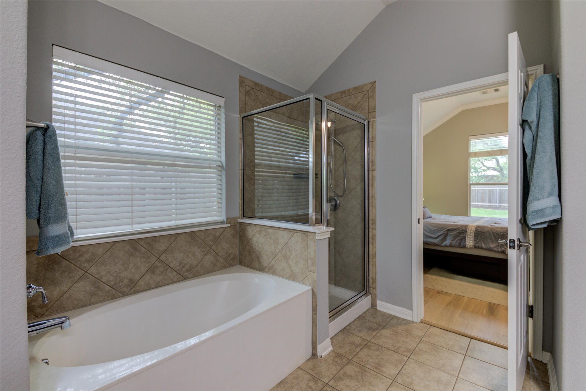 5412 Batak Lane Austin, TX 78749 - Photo 30 of 40 a bathroom with a bathtub and a sink