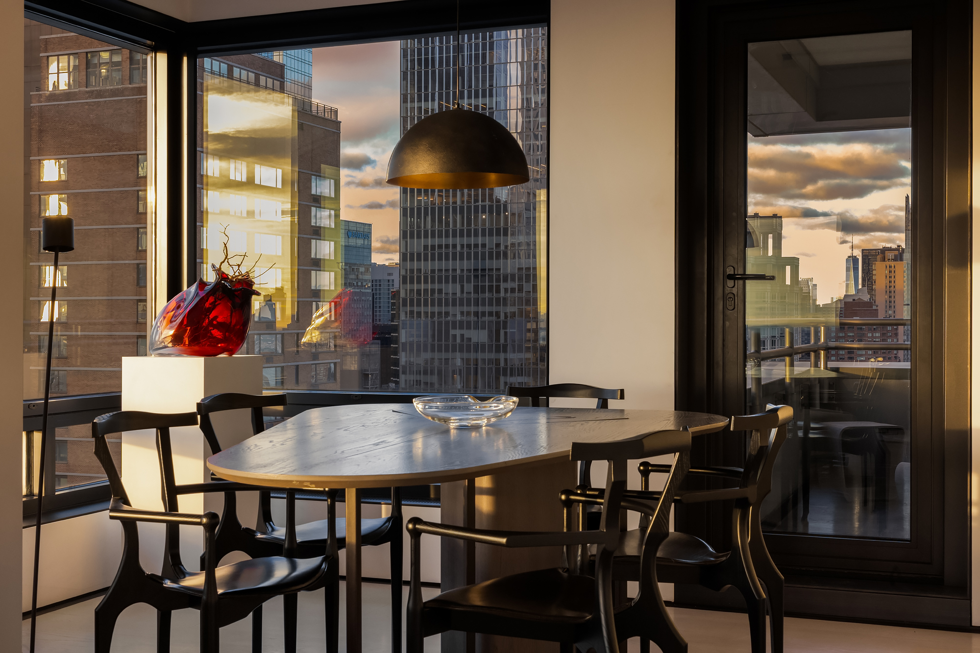 301 West 57th Street, Unit 36C Manhattan, NY 10019 - Photo 10 of 27 a view of a dining room with furniture and window