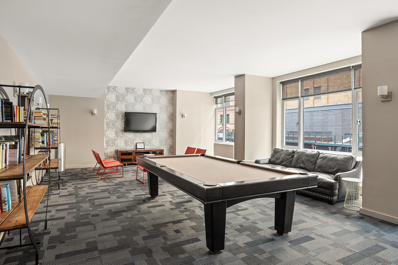 189 Schermerhorn Street, Unit 16G Brooklyn, NY 11201 - Photo 9 of 15 a living room with furniture and a flat screen tv