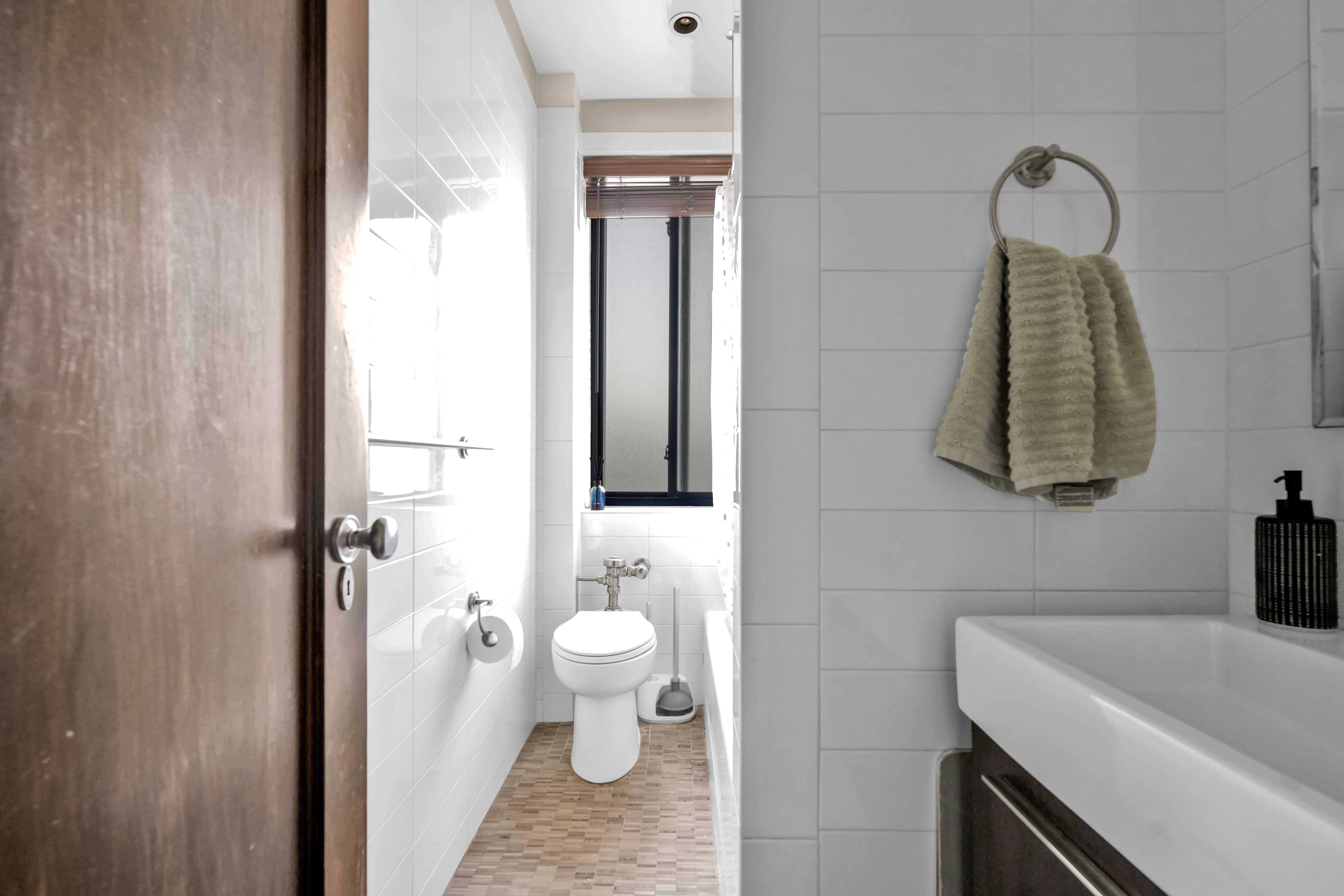 255 West 23rd Street, Unit 5GW Manhattan, NY 10011 - Photo 21 of 35 a bathroom with a sink and a mirror