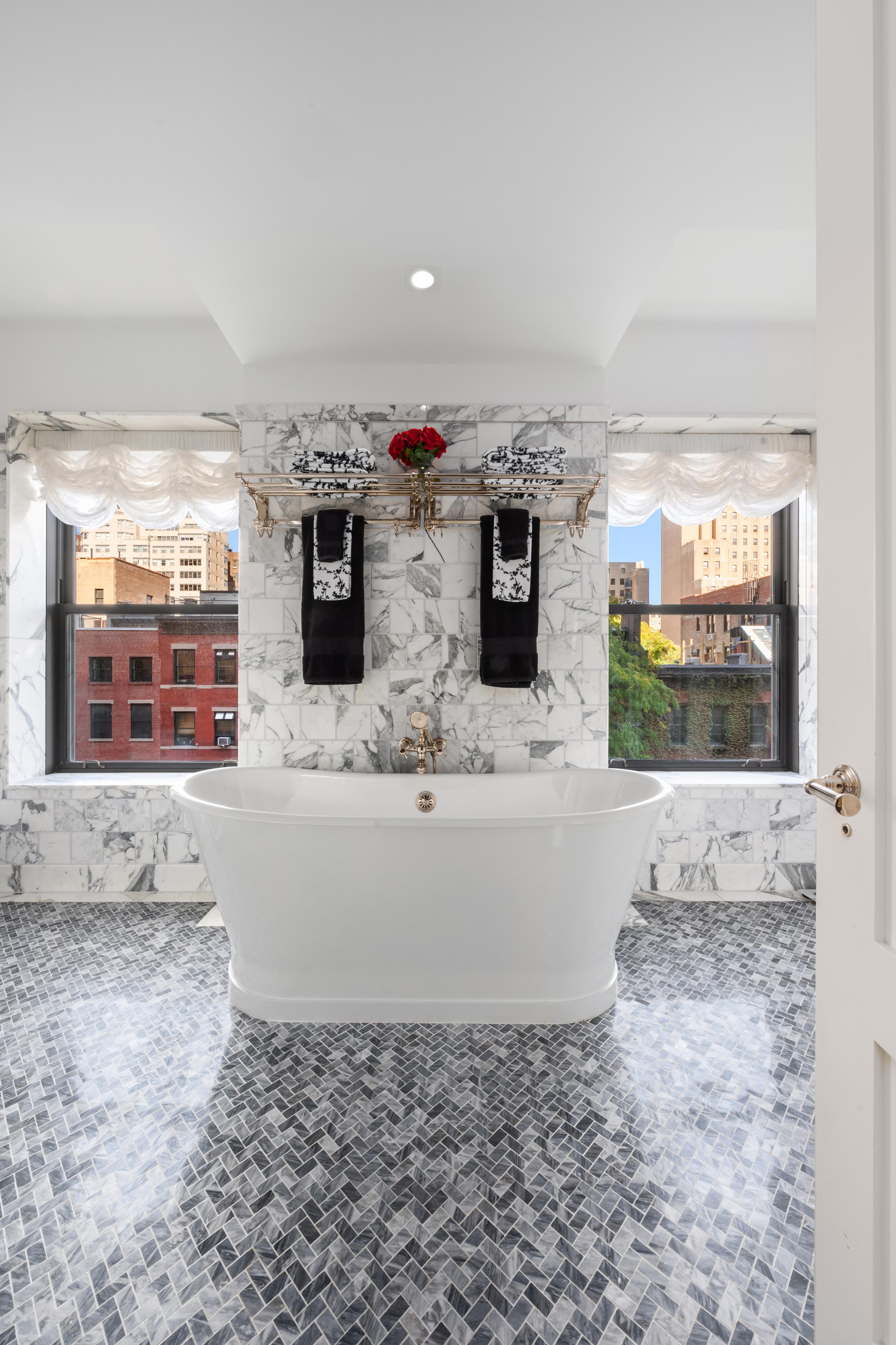 150 West 12th Street, Unit 3WEST Manhattan, NY 10011 - Photo 8 of 39 a living room with fireplace furniture and a flat screen tv