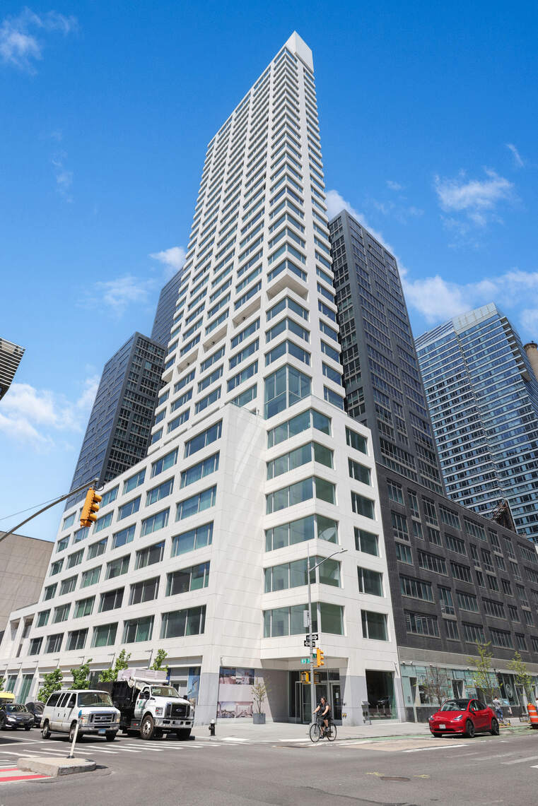 611 West 56th Street, Unit 2D Manhattan, NY 10019 - Photo 9 of 10 a front view of a building