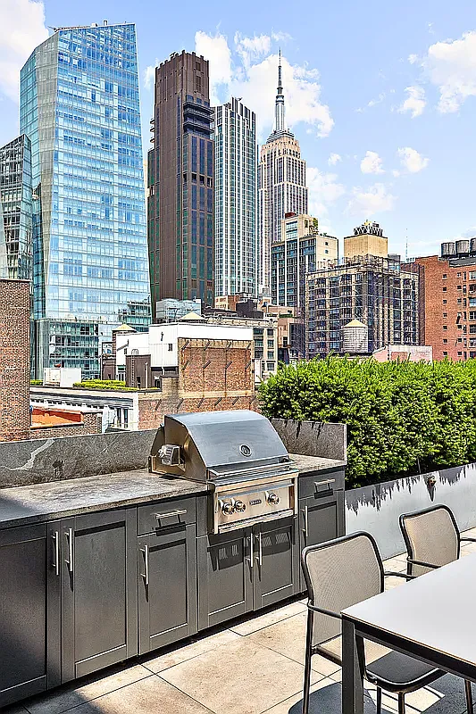 88 Lexington Avenue, Unit 802 Manhattan, NY 10016 - Photo 14 of 22 a view of a chairs and table in the terrace
