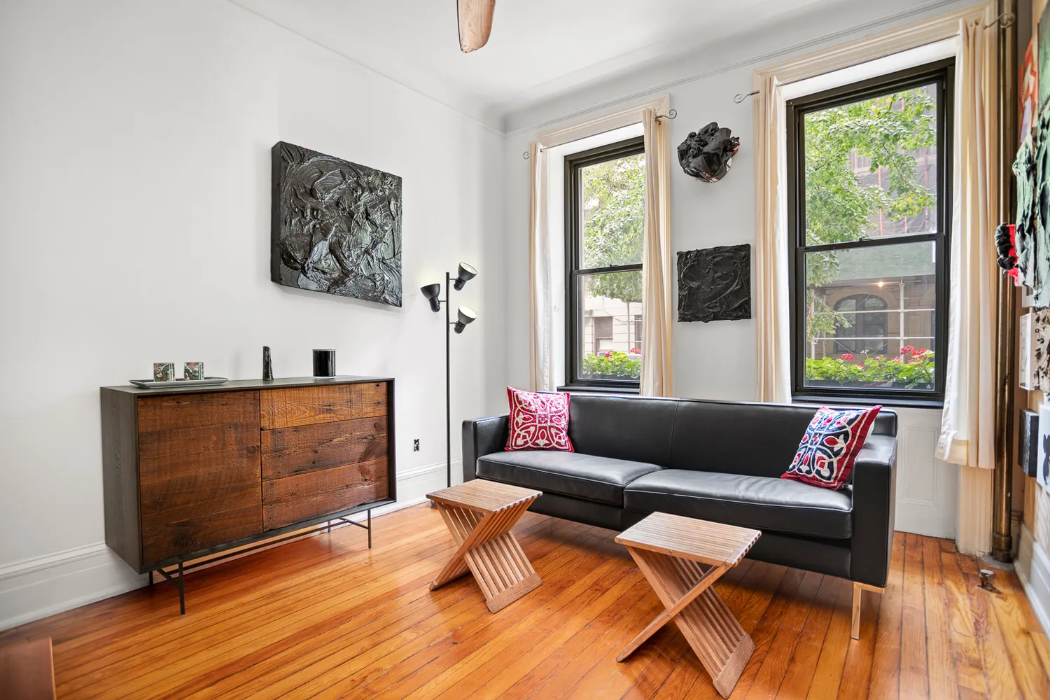 a living room with furniture and a window
