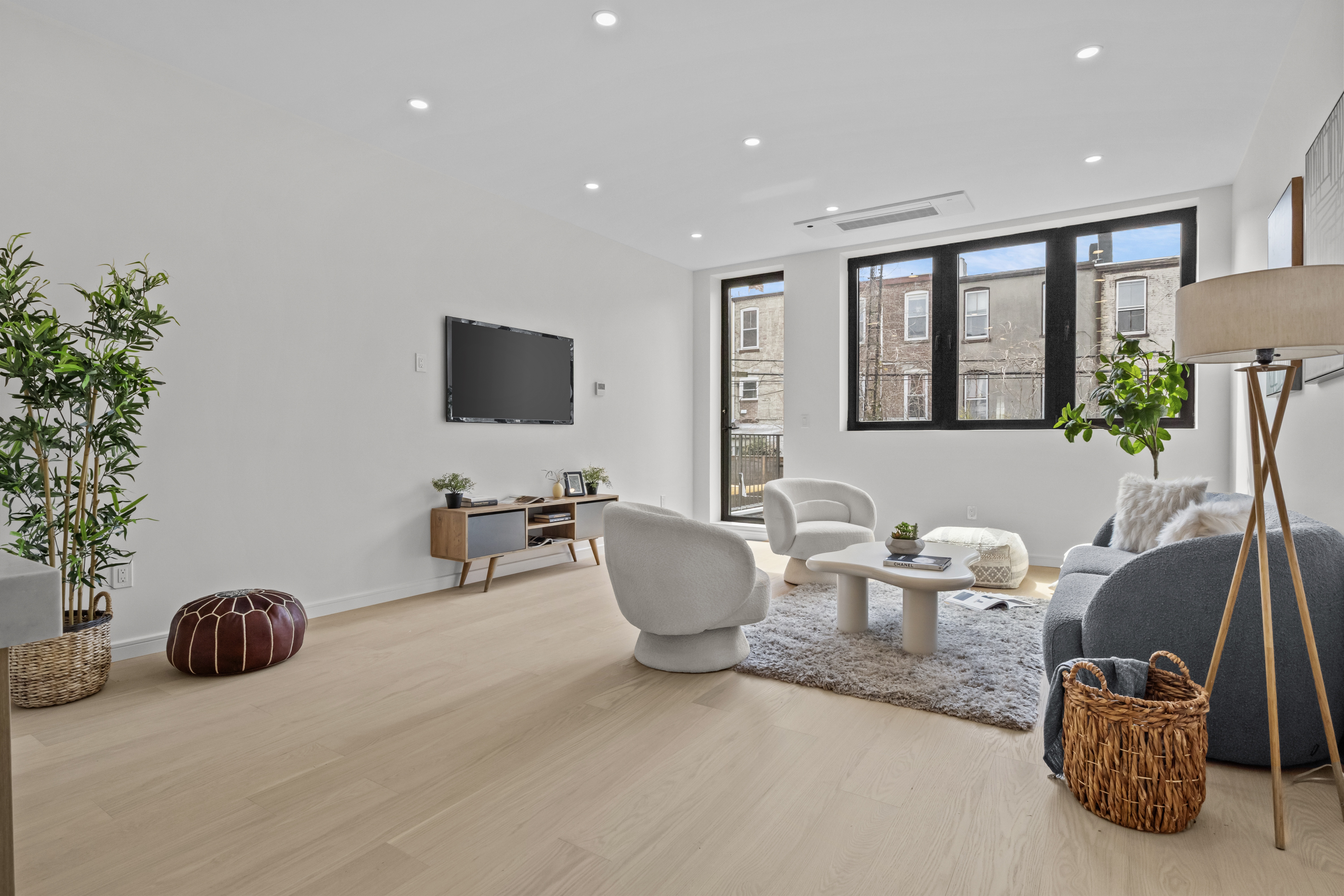 320 10th Street Brooklyn, NY 11215 - Photo 6 of 27 a living room with furniture and a flat screen tv